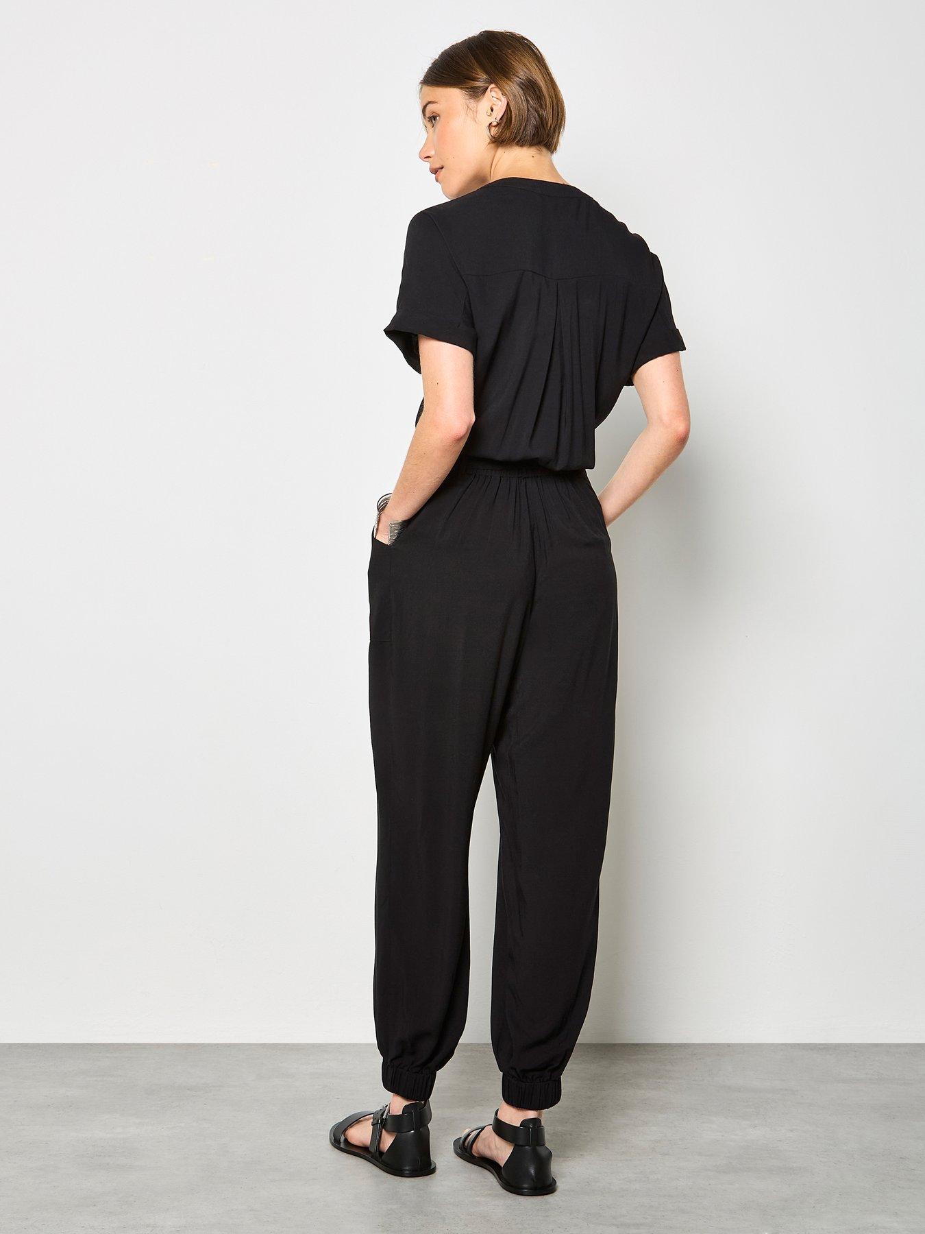  image of apricot-fluid-soft-utility-jumpsuit