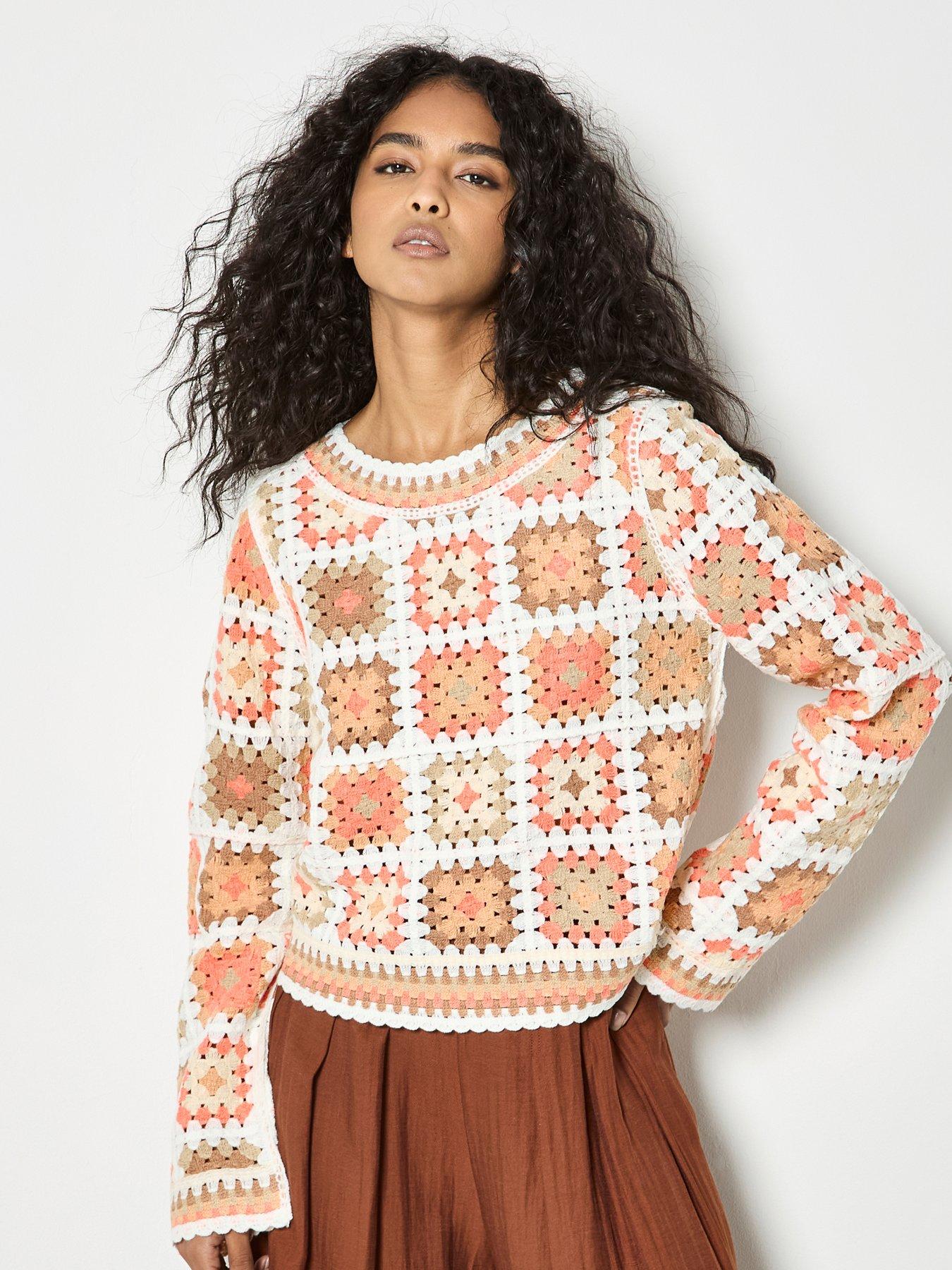 front image of apricot-crochet-squares-jumper-orange