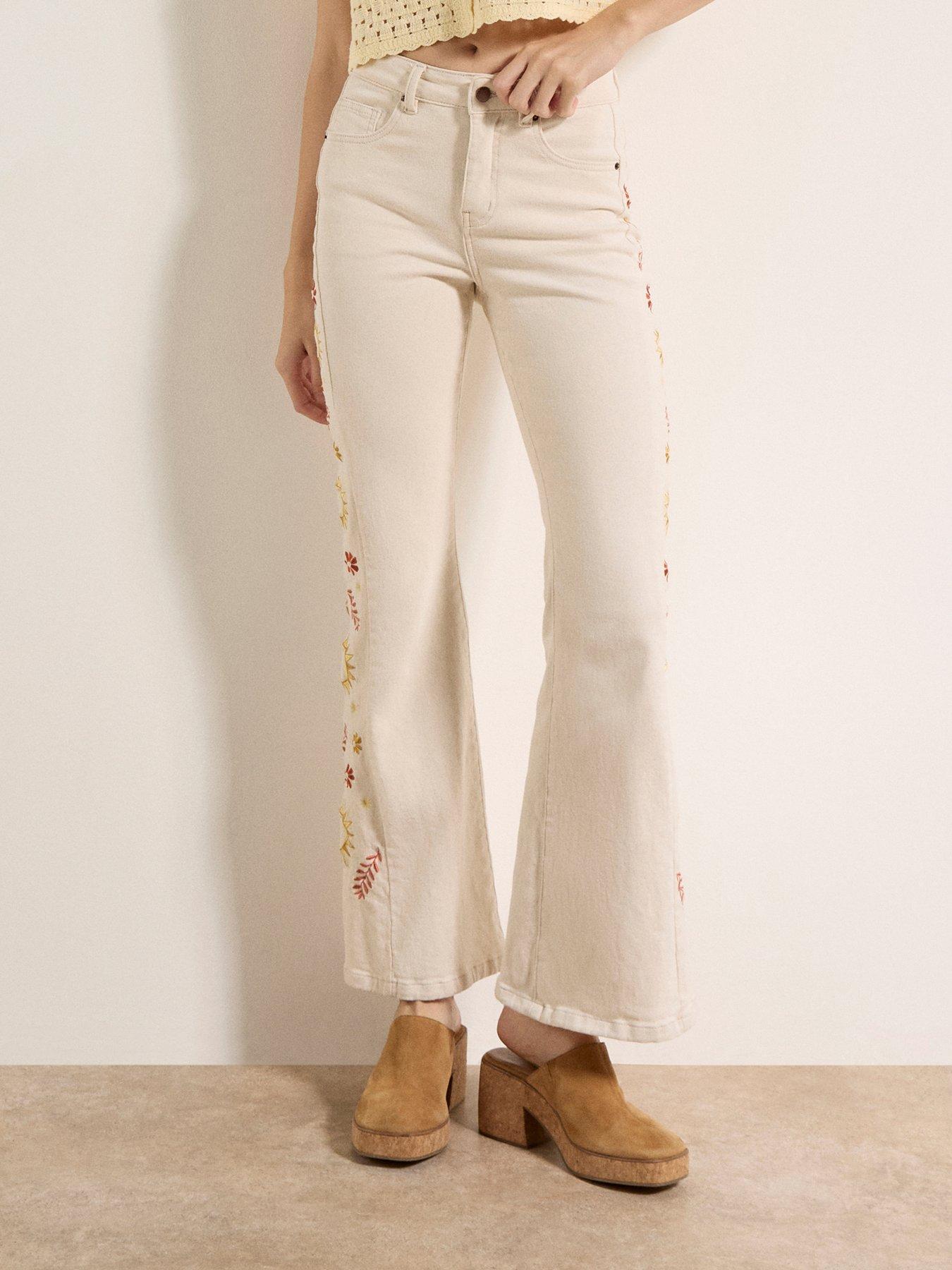  image of apricot-side-embroidered-flare-jeans-cream