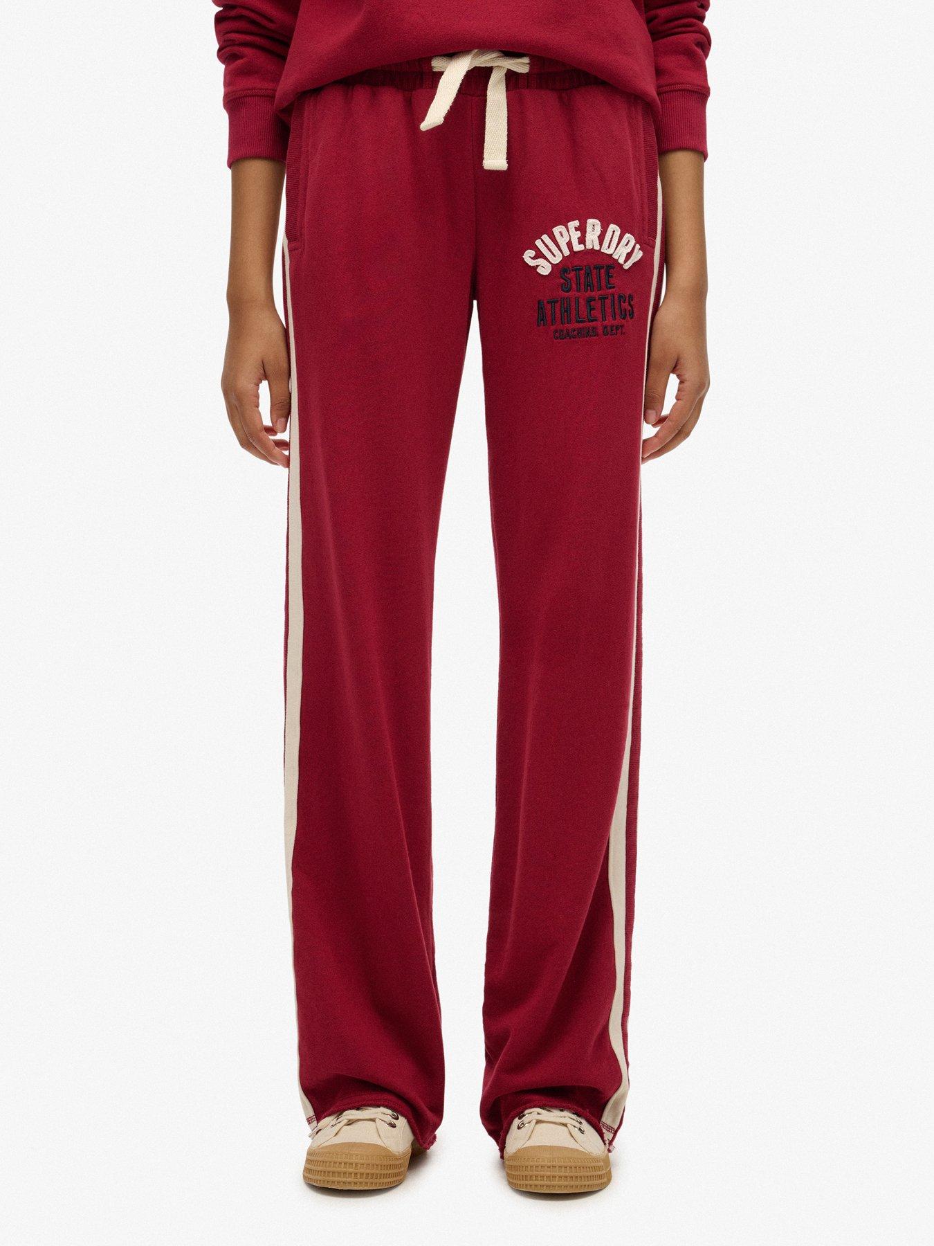 Image 1 of 7 of Superdry Ath Ess Hockey Joggers - Red
