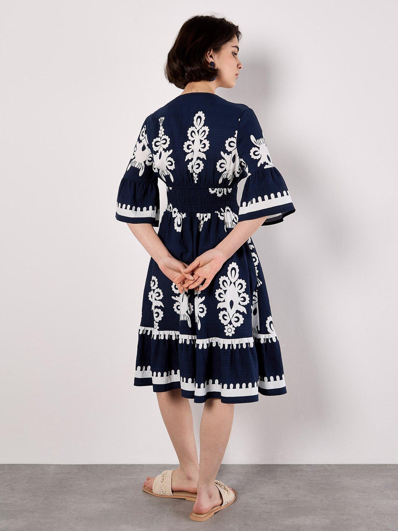 Image 2 of 5 of Apricot Floral Baroque Smock Border Drs