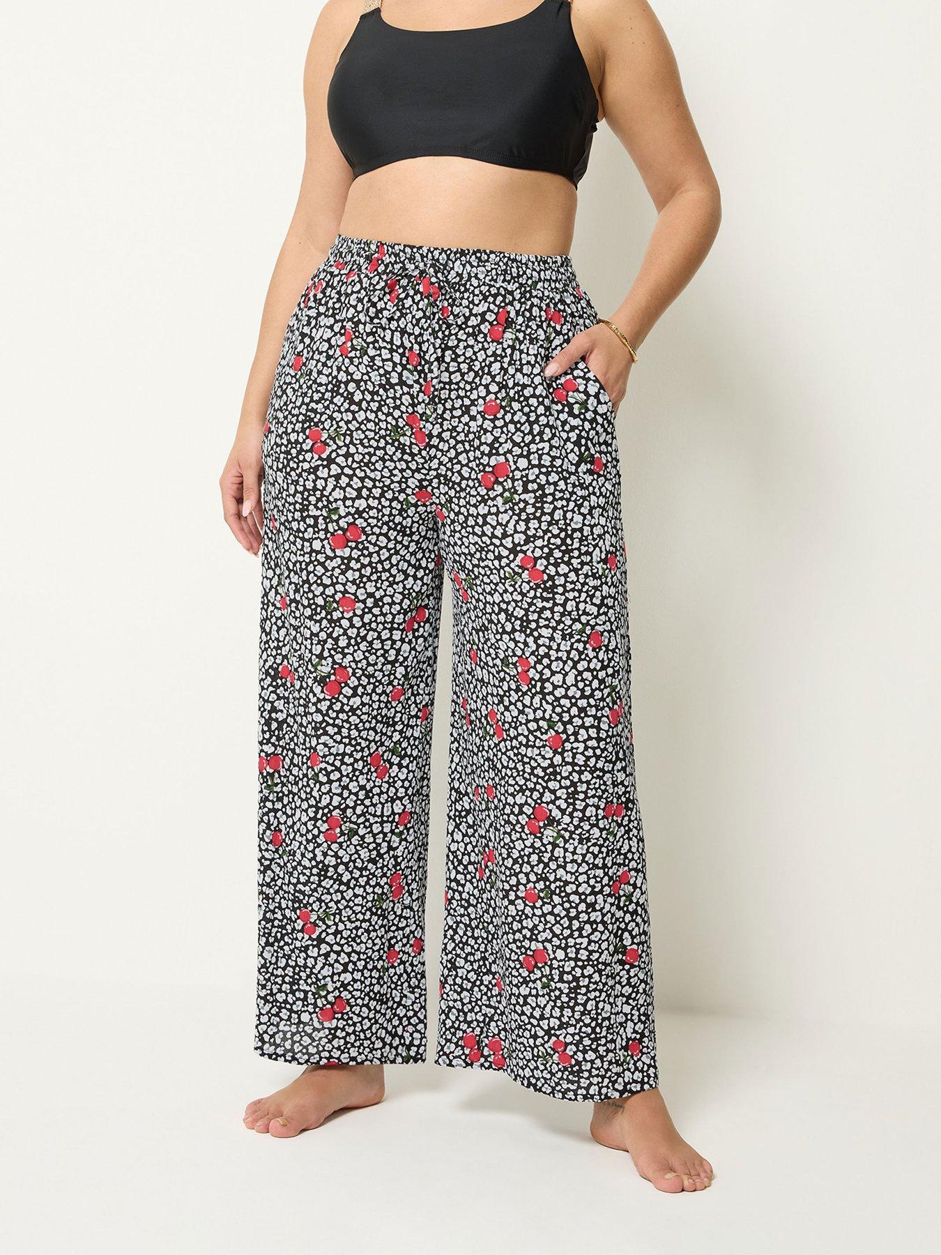 Image 3 of 4 of Yours Curve Cherry &amp; Leopard Print Wide Leg Crinkle Trousers - Black