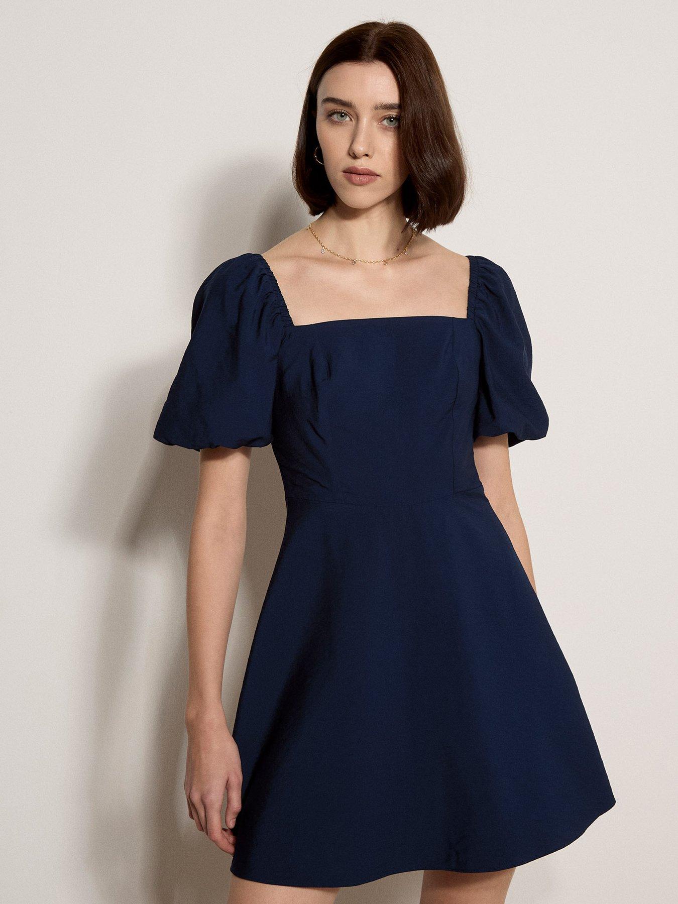 Image 1 of 5 of Apricot Fit Flare Volume Slv Mini Dress