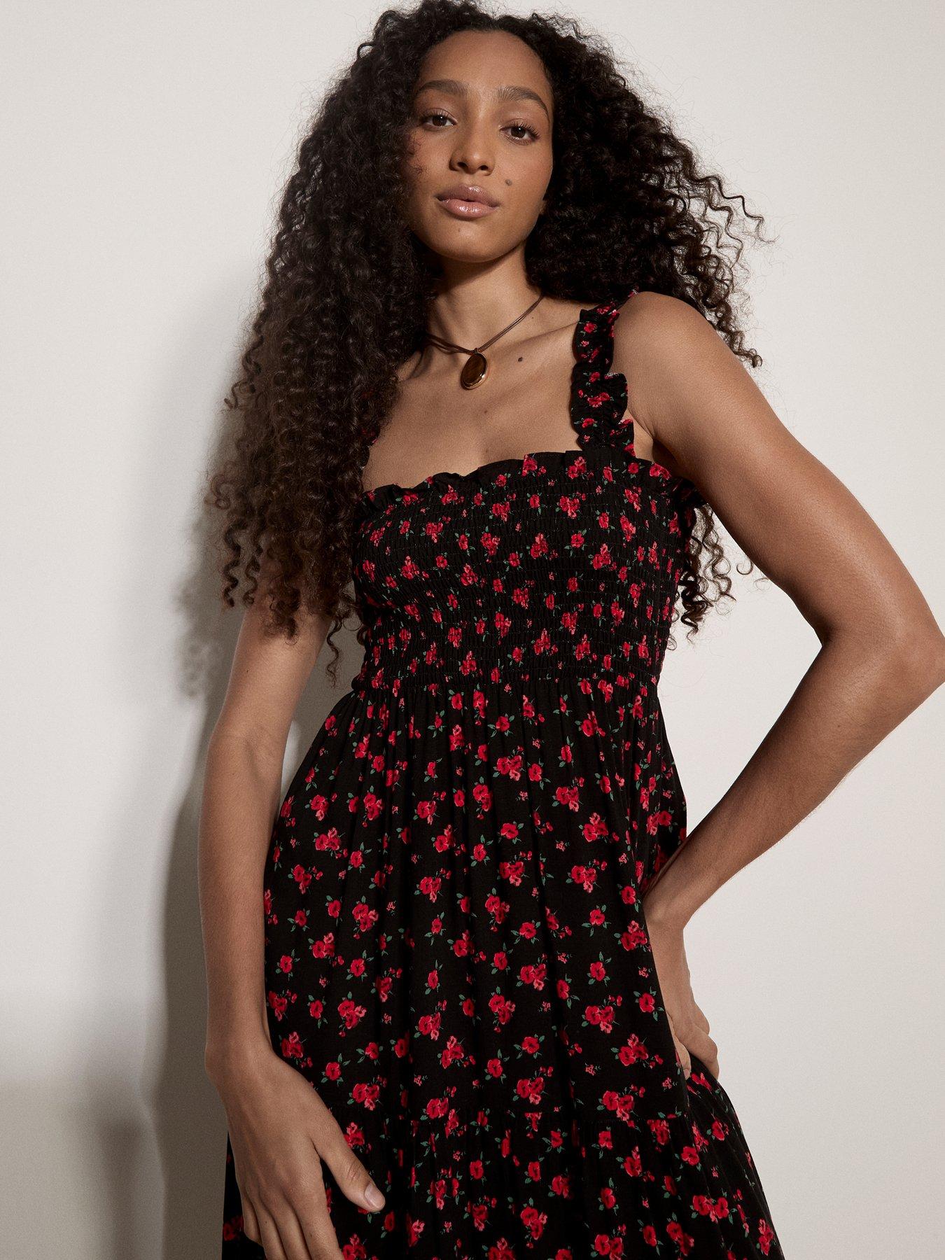 Image 1 of 4 of Apricot Spaced Ditsy Smocked Tiered Drs - Black