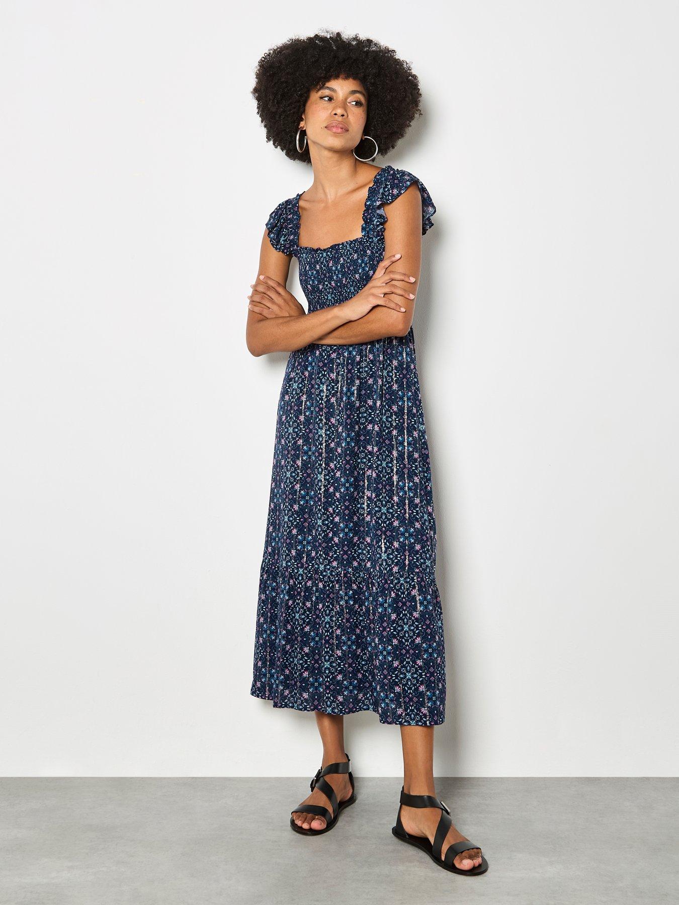  image of apricot-ruffle-strap-tiered-midi-dress-blue