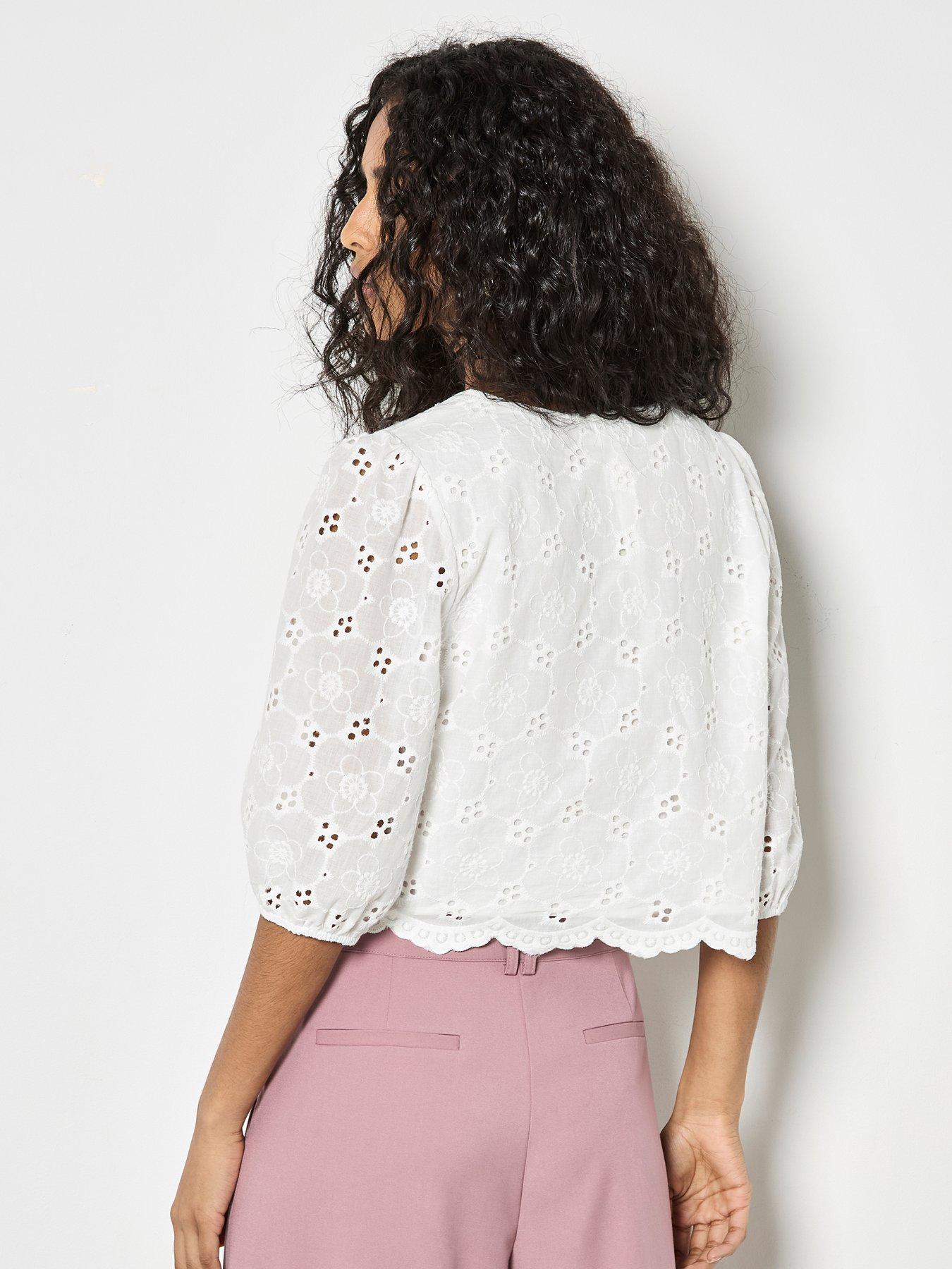  image of apricot-daisy-broderie-button-top