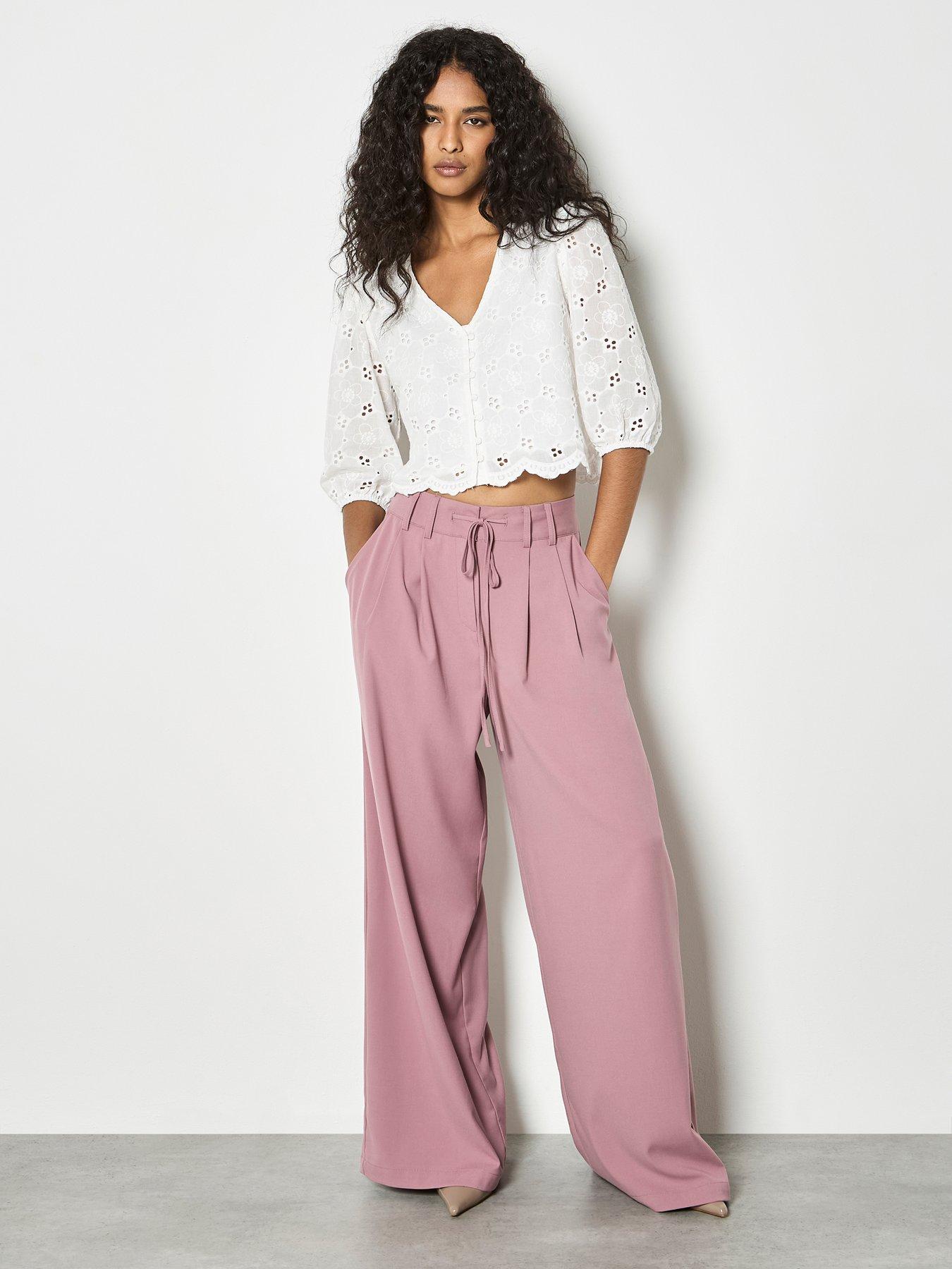  image of apricot-daisy-broderie-button-top