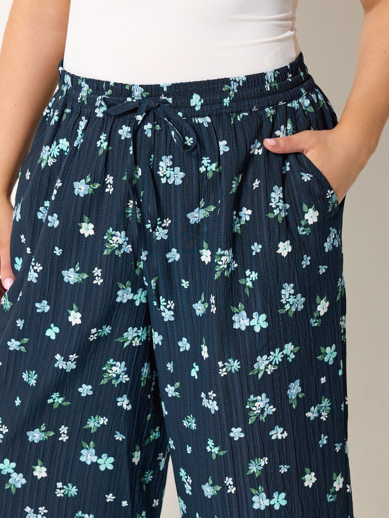 Image 4 of 4 of Yours Curve Crinkle Floral Print Crop Trousers - Blue