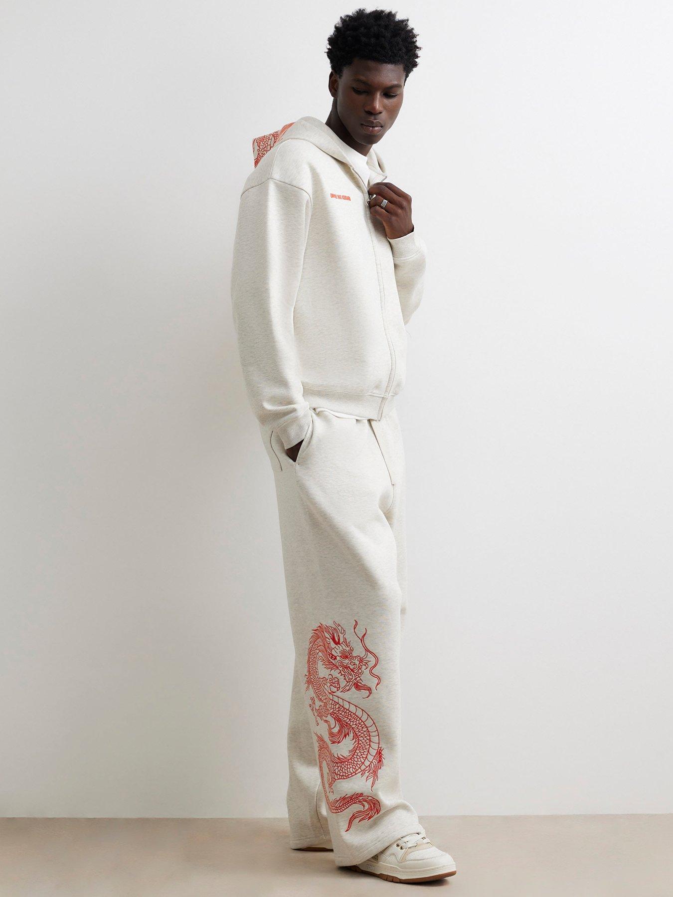 Image 3 of 6 of River Island Mens Wide Leg Snake Graphic Jogging Bottoms - Grey