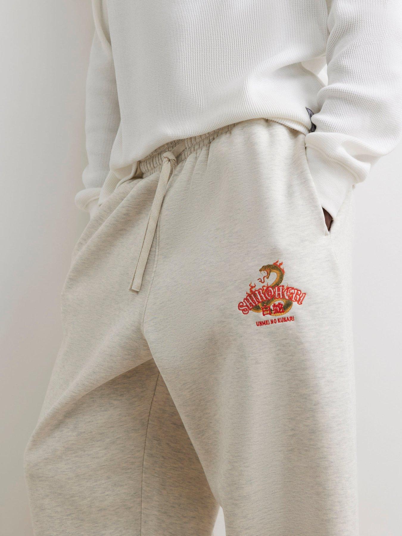 Image 5 of 6 of River Island Mens Wide Leg Snake Graphic Jogging Bottoms - Grey