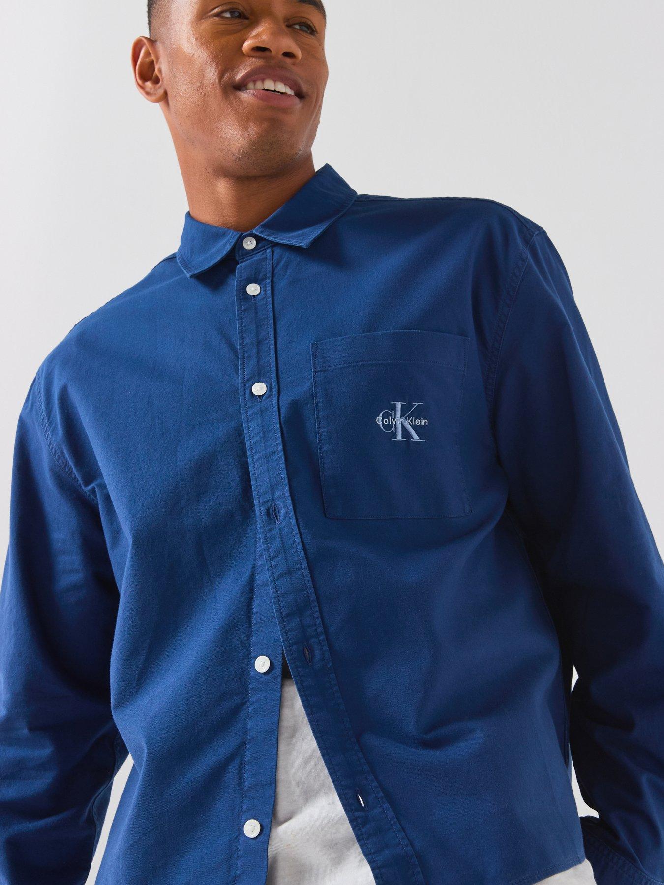 Image 6 of 6 of Calvin Klein Jeans Long Sleeve Solid 90s Fit Washed Oxford Shirt - Light Blue