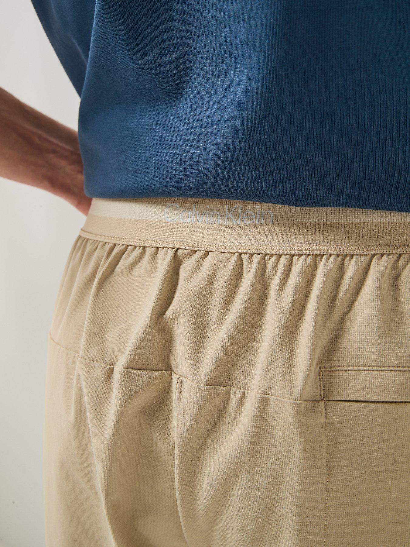 Image 4 of 6 of Calvin Klein Sport Commuter Woven Trousers - White
