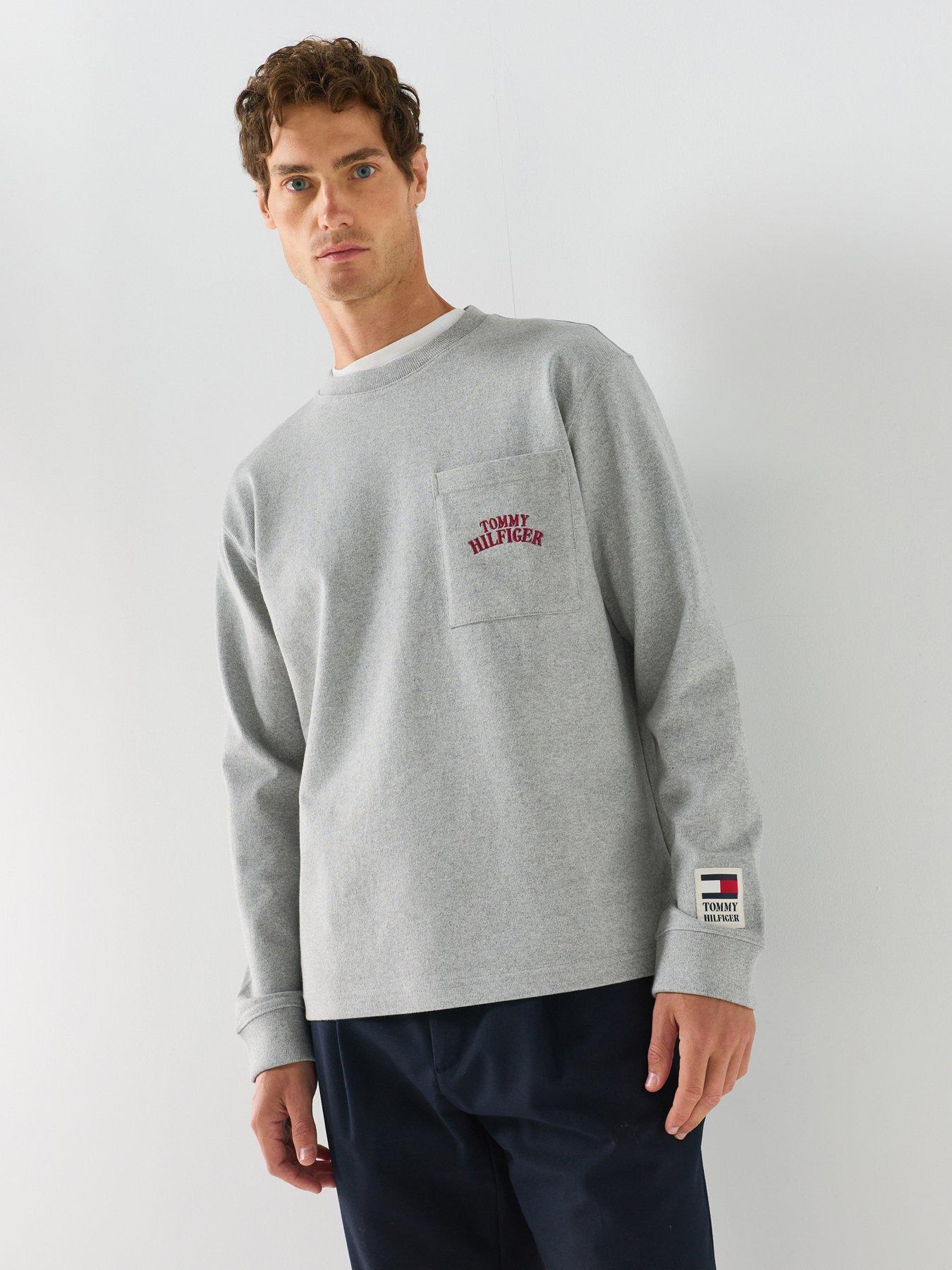 Image 1 of 5 of Tommy Hilfiger Graphic Relaxed Fit Varsity Pocket Long Sleeve T-Shirt - Light Grey