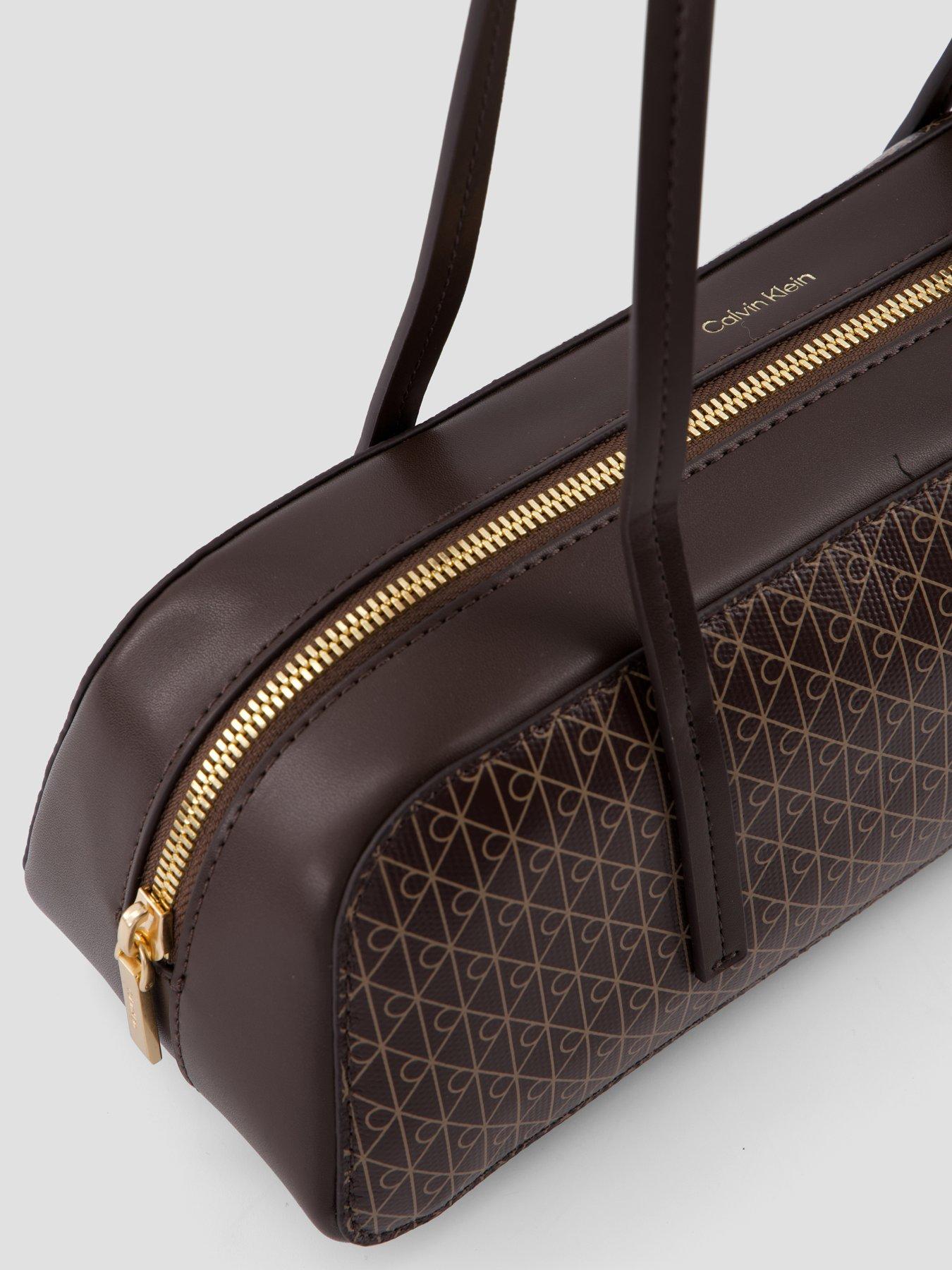 Image 4 of 4 of Calvin Klein Coated Emblem Print Barrel Bag - Brown