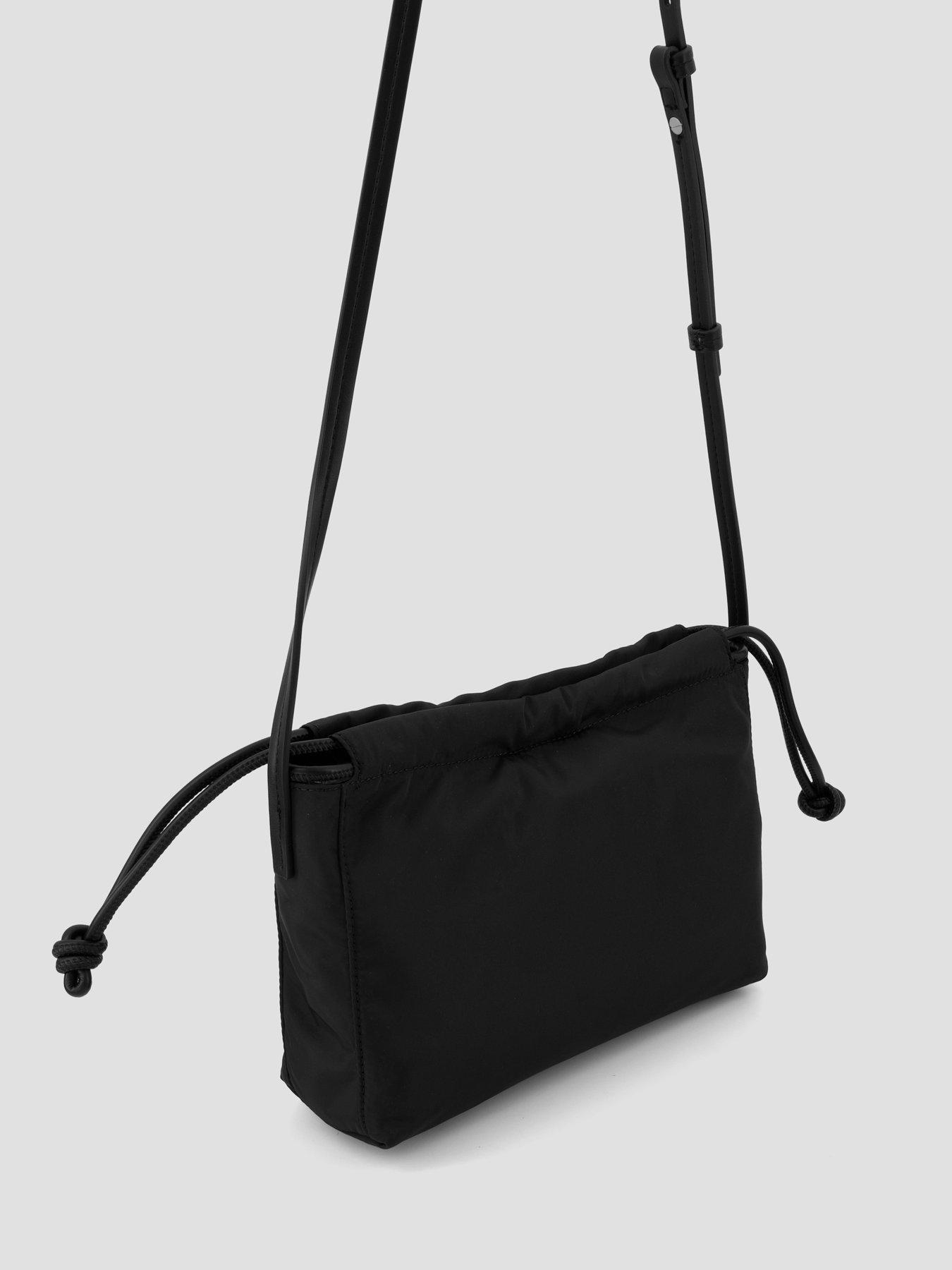 Image 3 of 6 of Calvin Klein Monologo Pocket Drawstring Crossbody Bag - Black