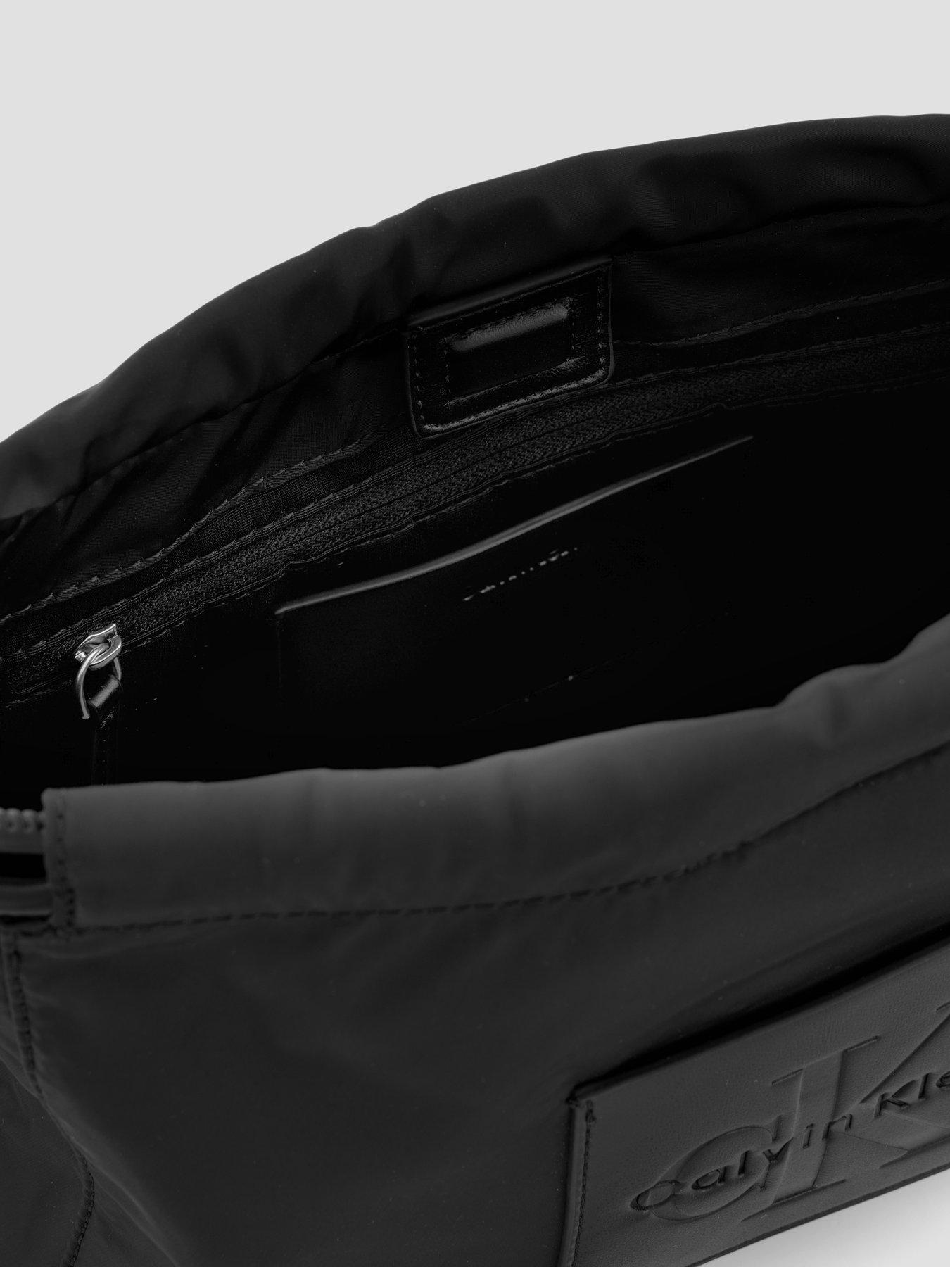 Image 4 of 6 of Calvin Klein Monologo Pocket Drawstring Crossbody Bag - Black