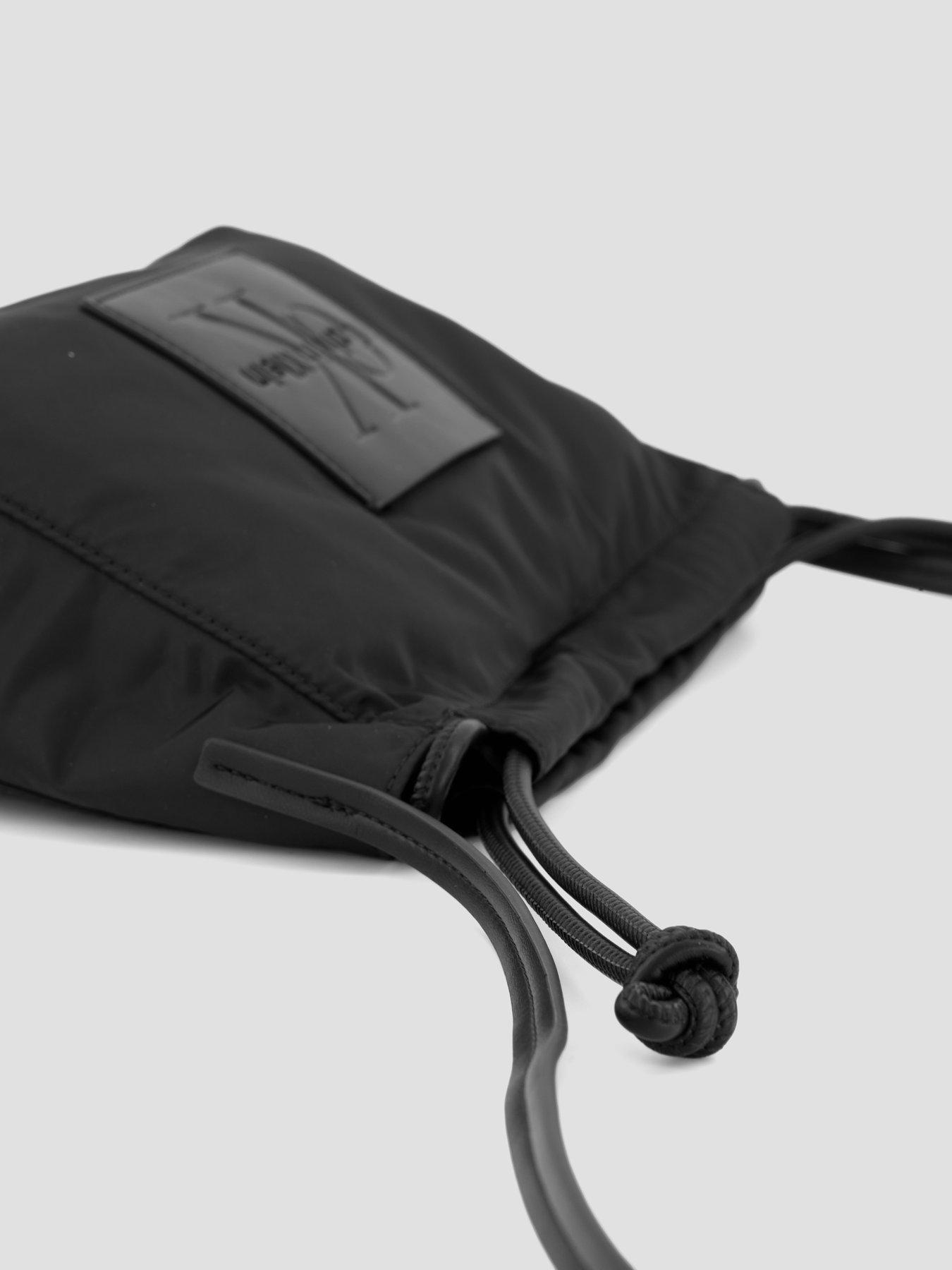 Image 5 of 6 of Calvin Klein Monologo Pocket Drawstring Crossbody Bag - Black