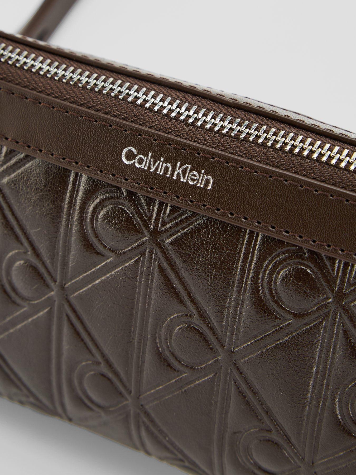 Image 4 of 5 of Calvin Klein Debossed Allover Emblem Logo Long Shoulder Bag - Brown