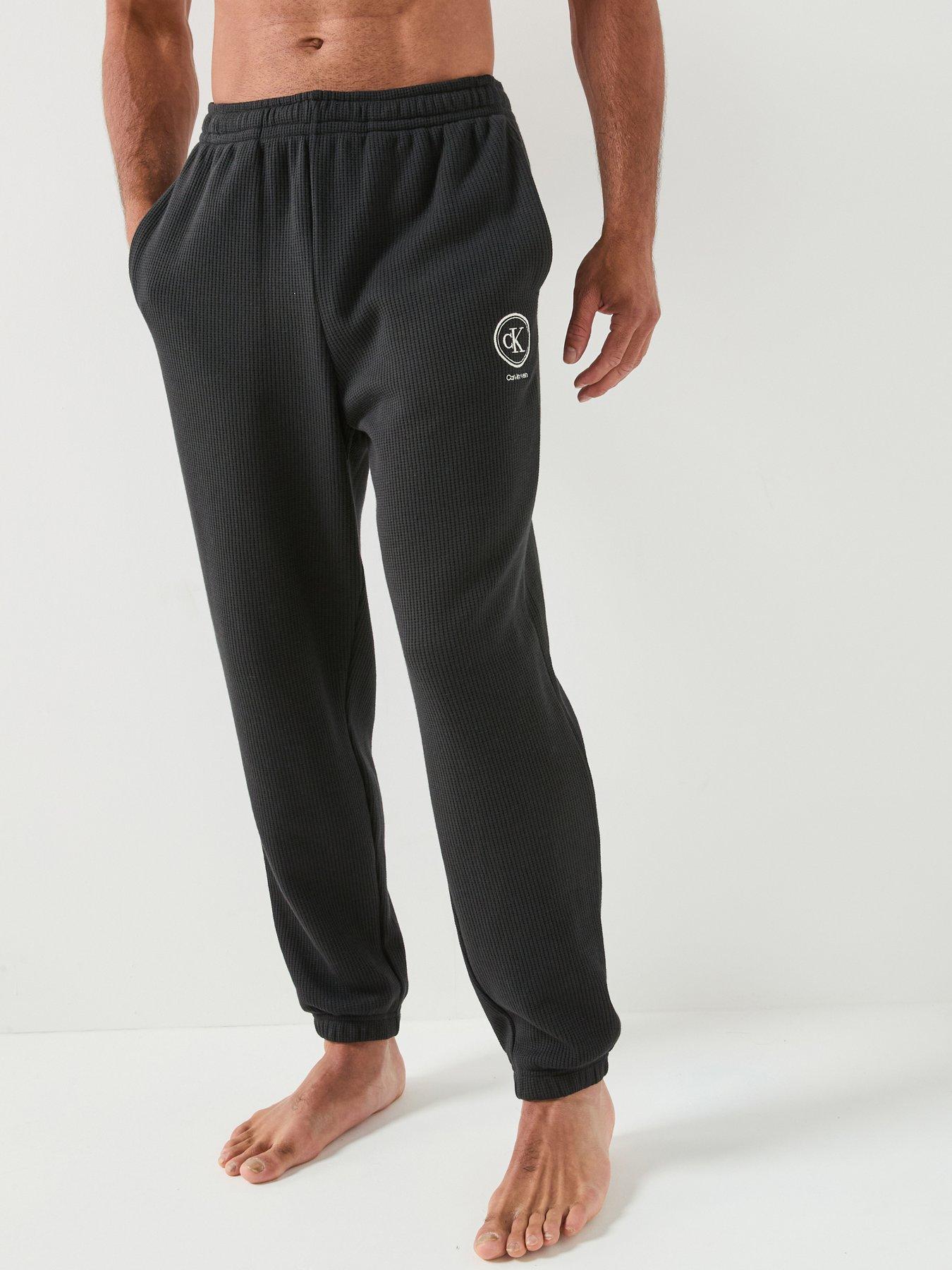 Image 1 of 6 of Calvin Klein Waffle Tracksuits - Black
