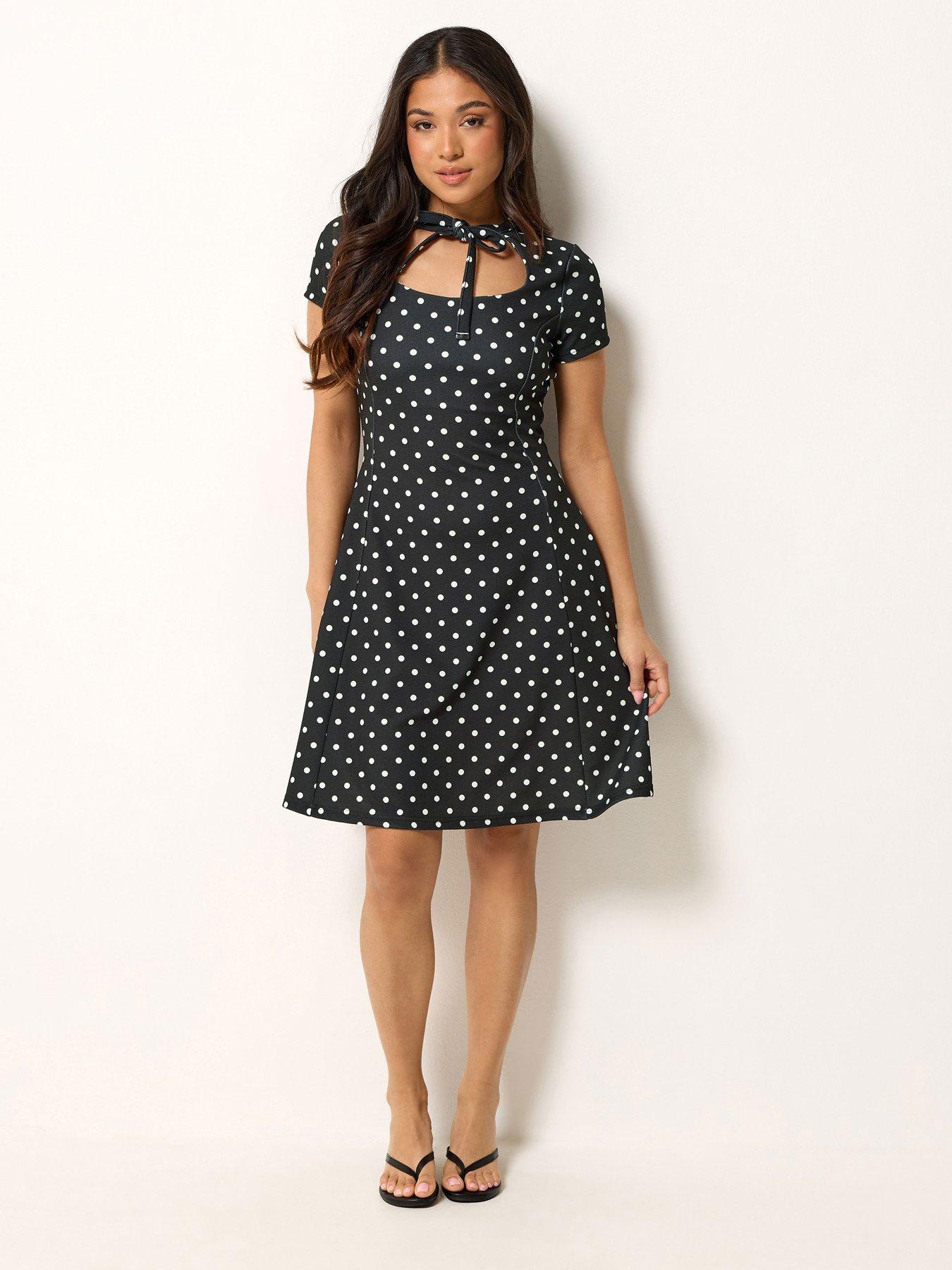 Image 3 of 4 of PixieGirl Petite Polka Dot Tie Front Mini Dress - Black &amp; White
