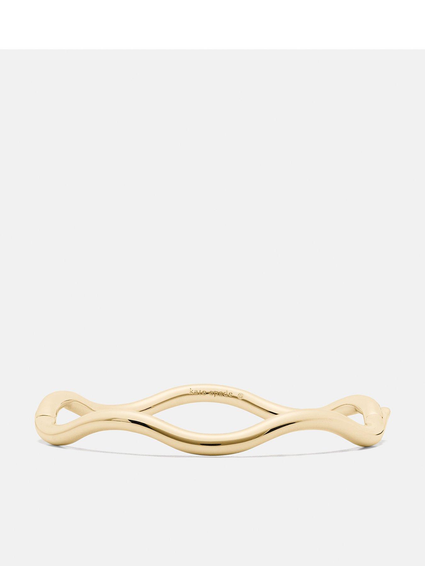 Image 1 of 3 of Kate Spade New York Womens Wave Slim Gold Tone Bangle - Gold