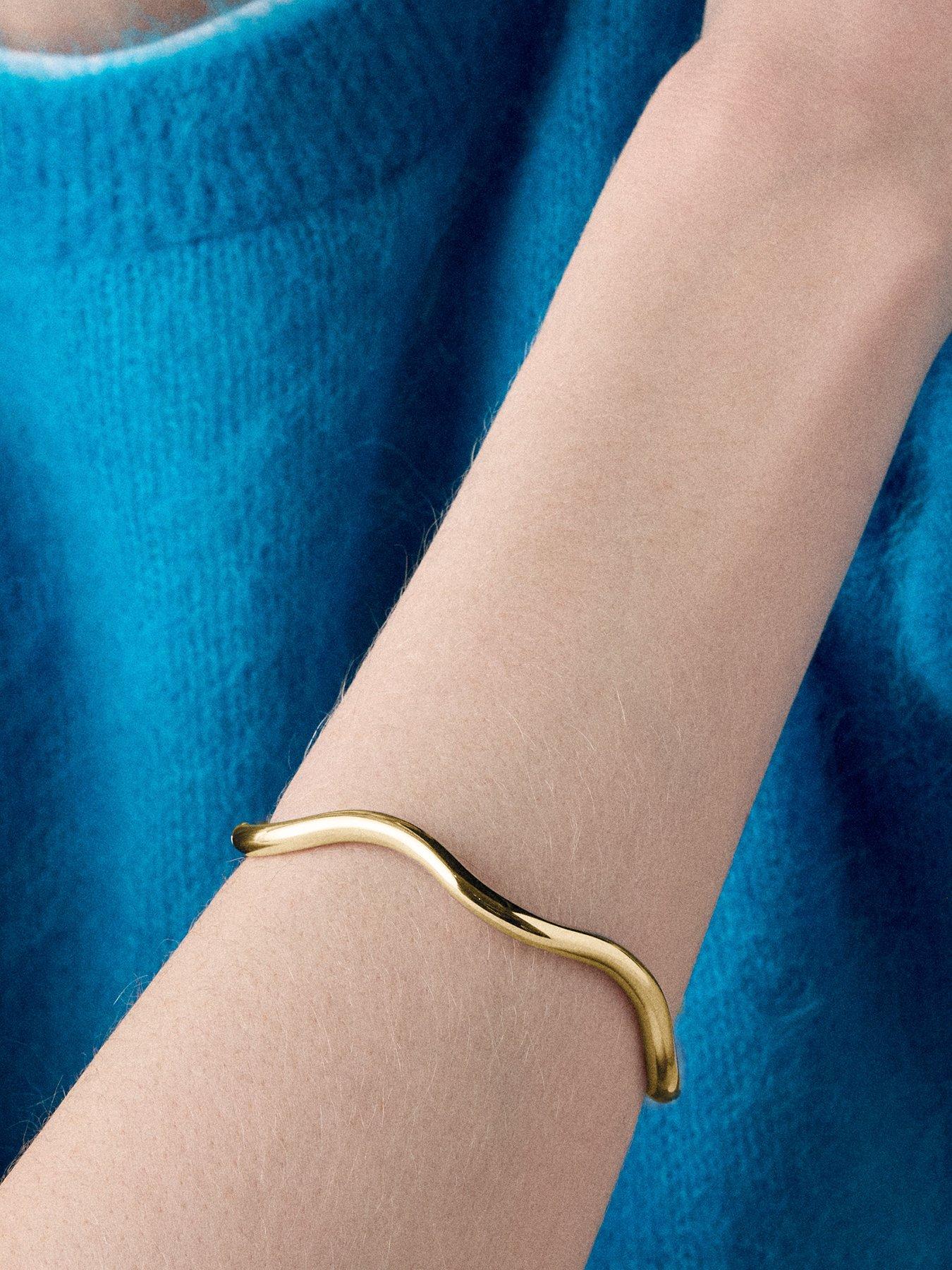 Image 2 of 3 of Kate Spade New York Womens Wave Slim Gold Tone Bangle - Gold
