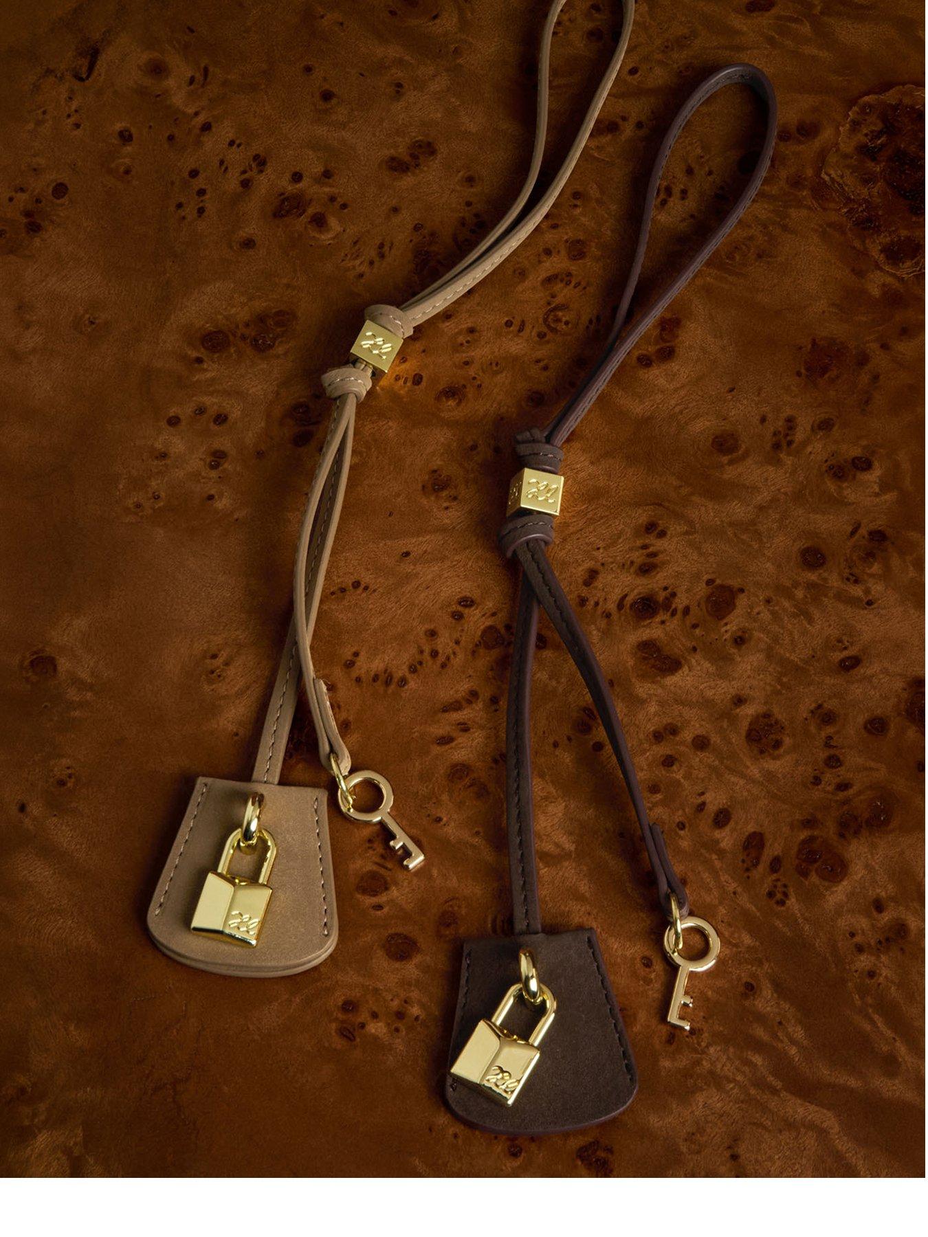 Image 1 of 5 of Katie Loxton Heritage Bag Charm - Chocolate Suedette