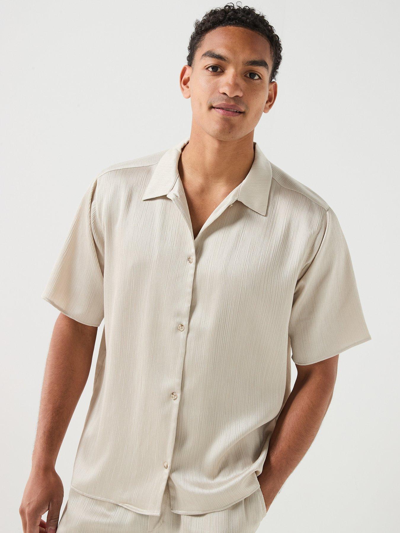 Image 1 of 6 of Les Deux Plisse Short Sleeve Shirt - Light Beige