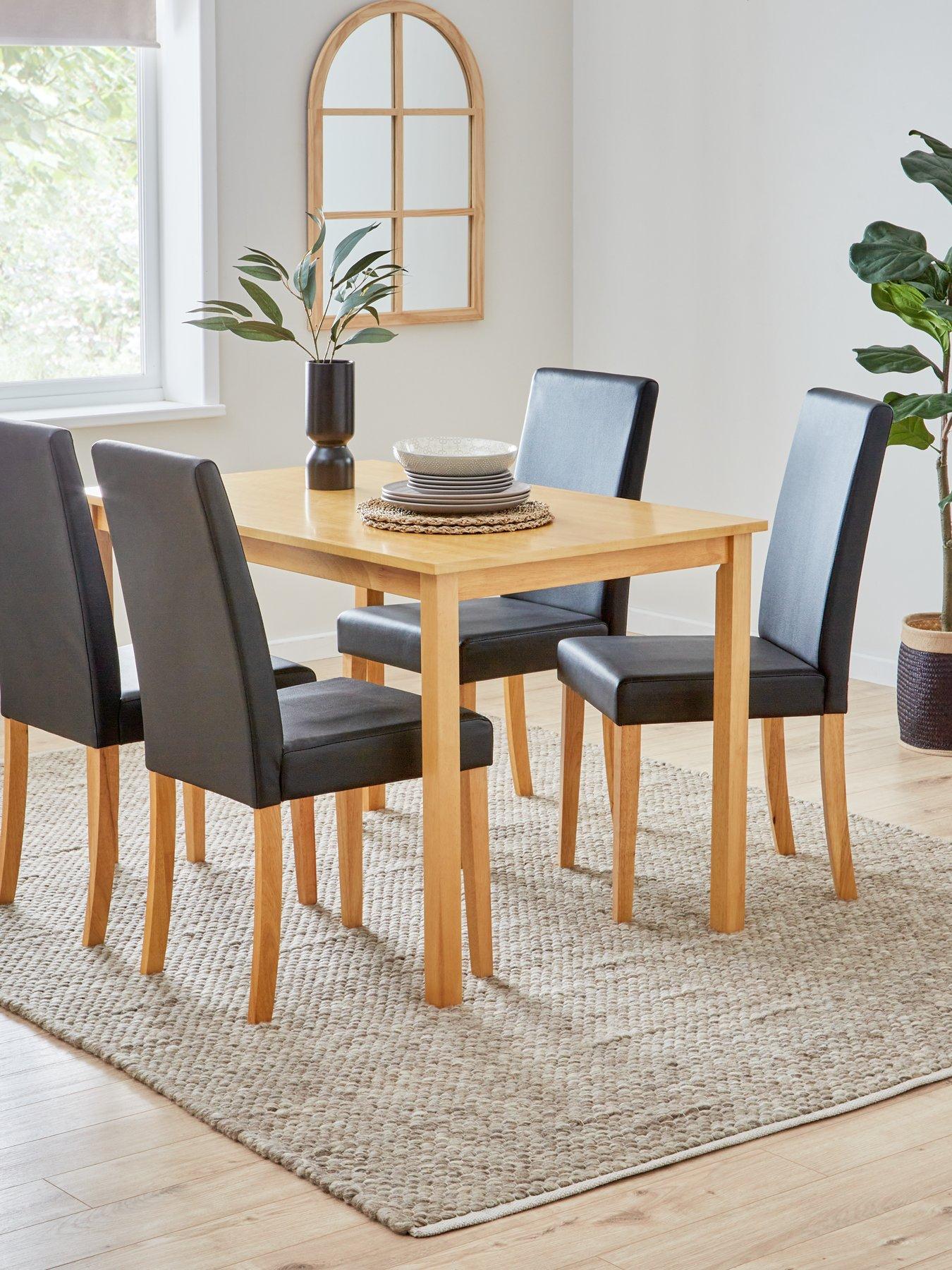 The Very Collection Primo Oak 120cm & 4 Faux Leather Black Chairs