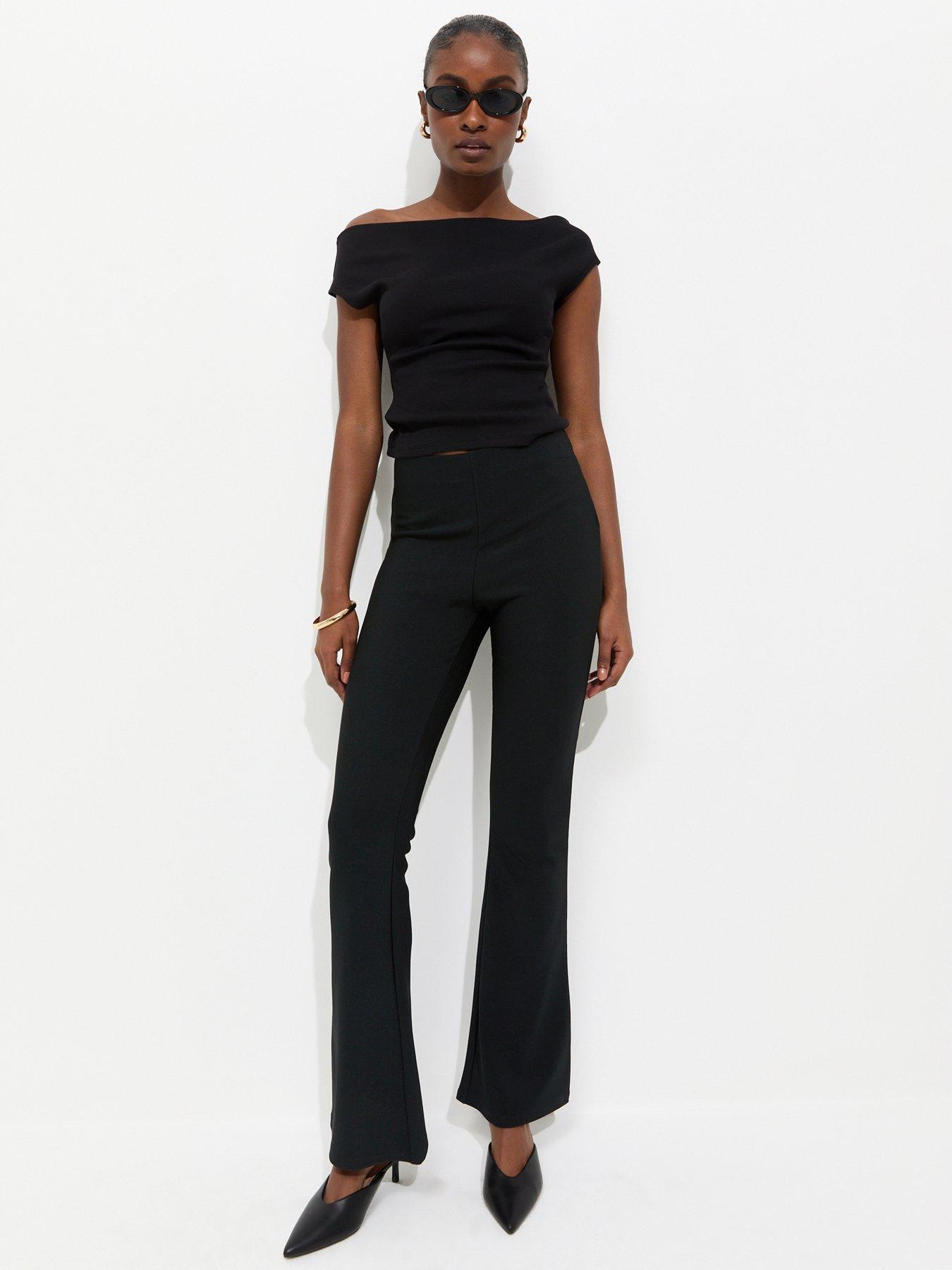 Image 1 of 5 of New Look Ribbed Flared Trousers - Black