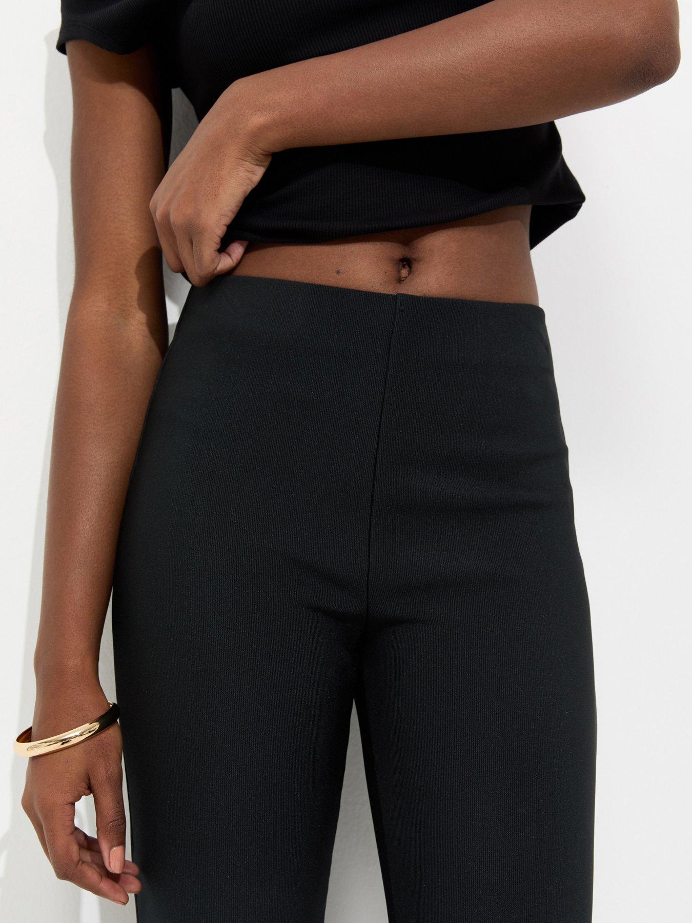 Image 5 of 5 of New Look Ribbed Flared Trousers - Black