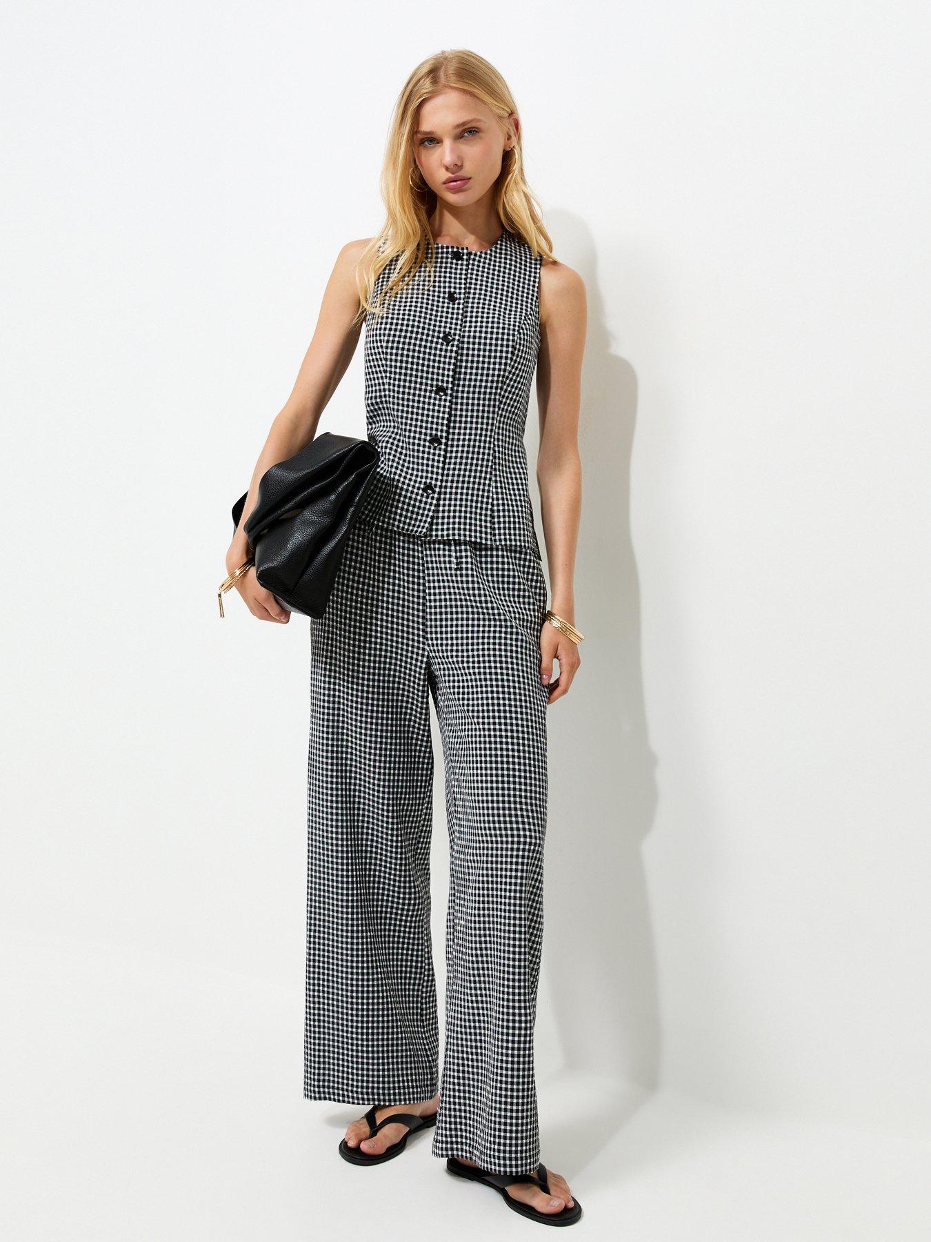 Image 1 of 5 of New Look Gingham Print Wide Leg Drawstring Trousers - Black