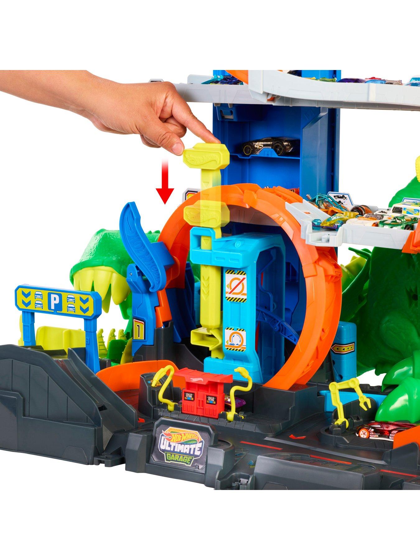 Image 4 of 7 of Hot Wheels <p>Ultimate T-Rex Garage Track Set with Dinosaur Nemesis &amp; Storage</p>