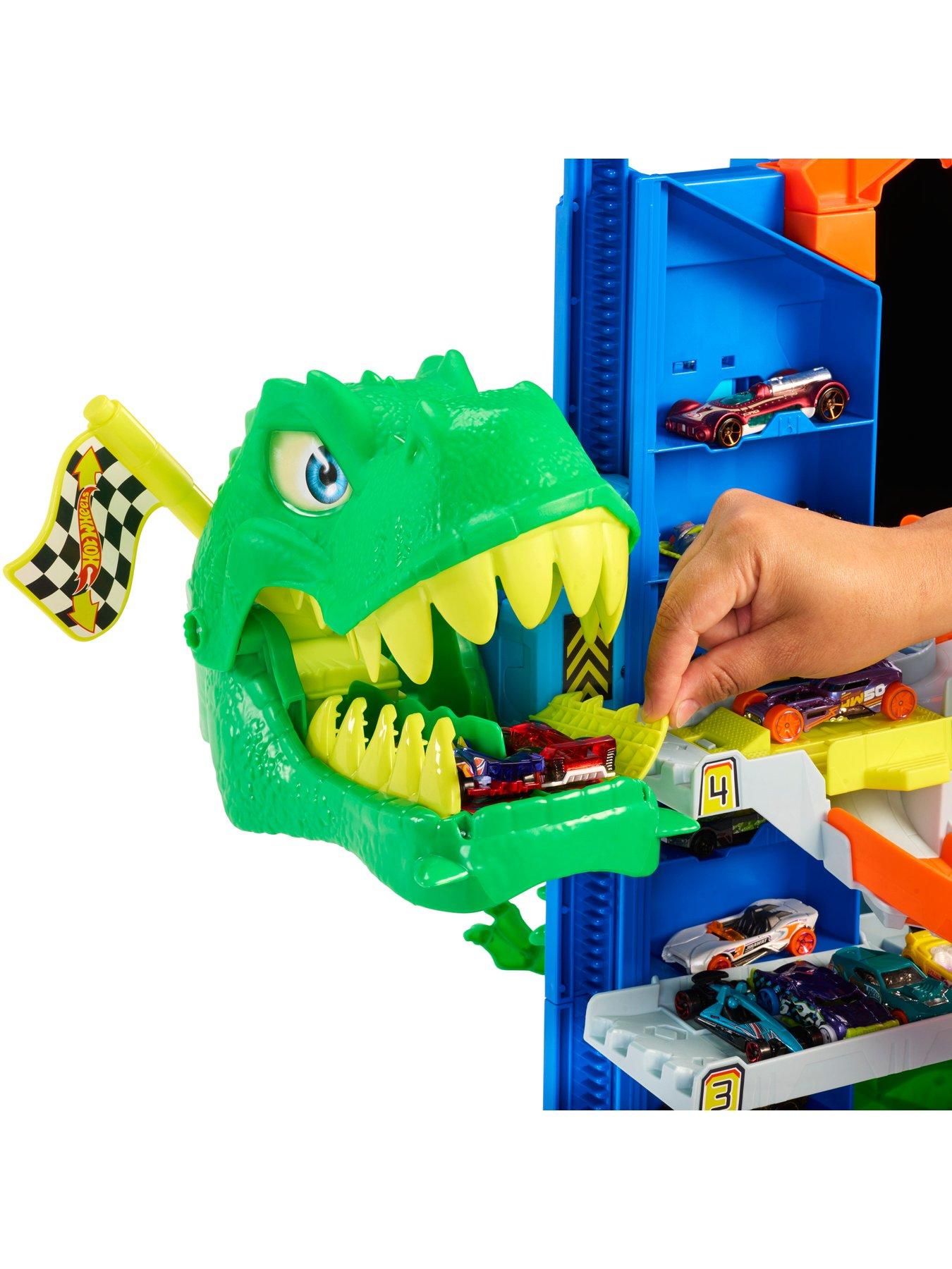 Image 6 of 7 of Hot Wheels <p>Ultimate T-Rex Garage Track Set with Dinosaur Nemesis &amp; Storage</p>