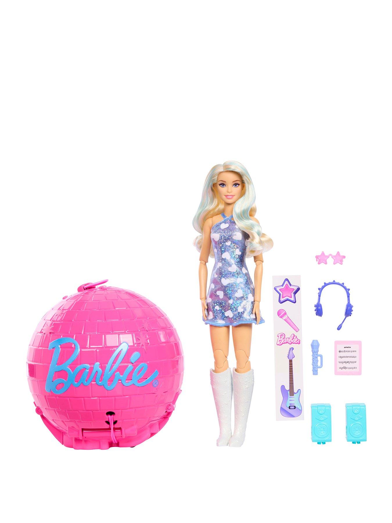 Barbie Team Barbie™ Roll  &  Reveal Pop Star Doll with 8 Music-Themed Surprises
