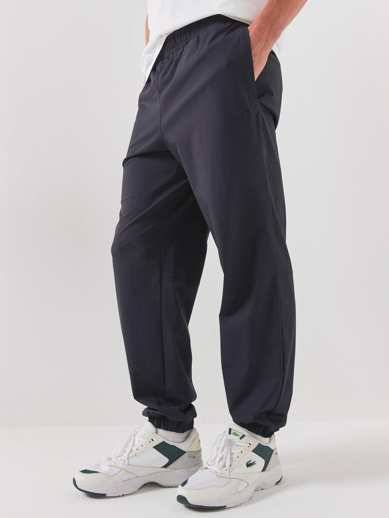 Image 1 of 5 of Lacoste Commuter Tech Tracksuit Joggers - Navy