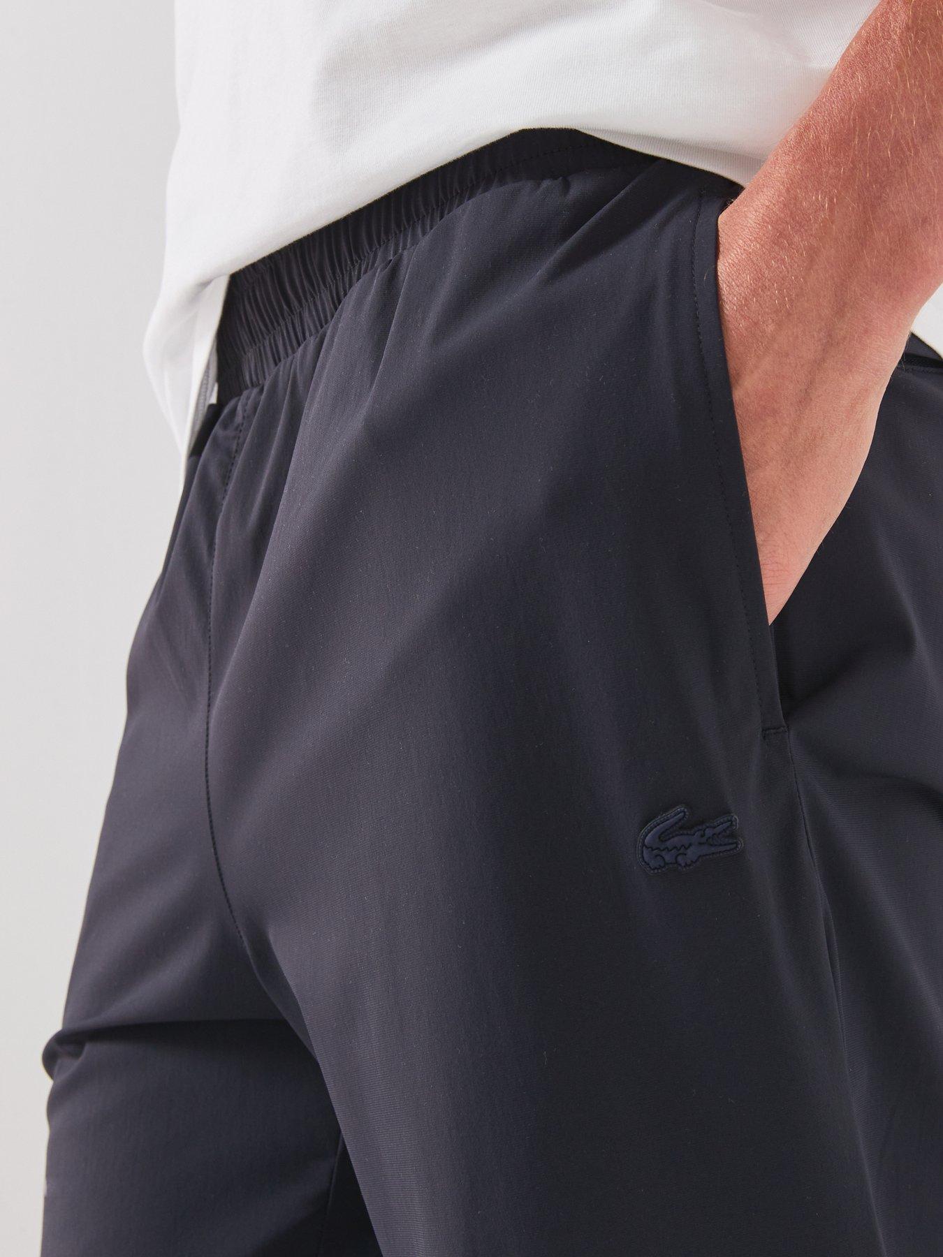 Image 4 of 5 of Lacoste Commuter Tech Tracksuit Joggers - Navy