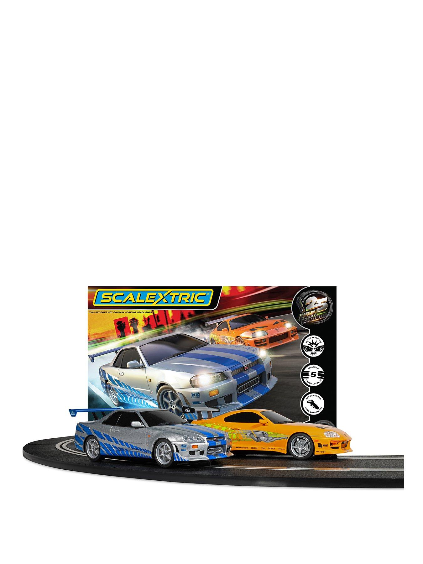 Image 1 of 7 of Scalextric Fast and Furious - 25 Years - Supra vs R34