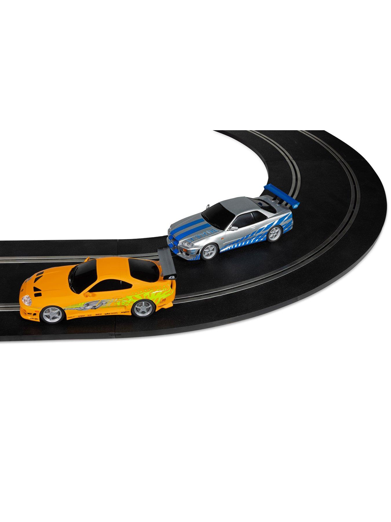 Image 3 of 7 of Scalextric Fast and Furious - 25 Years - Supra vs R34