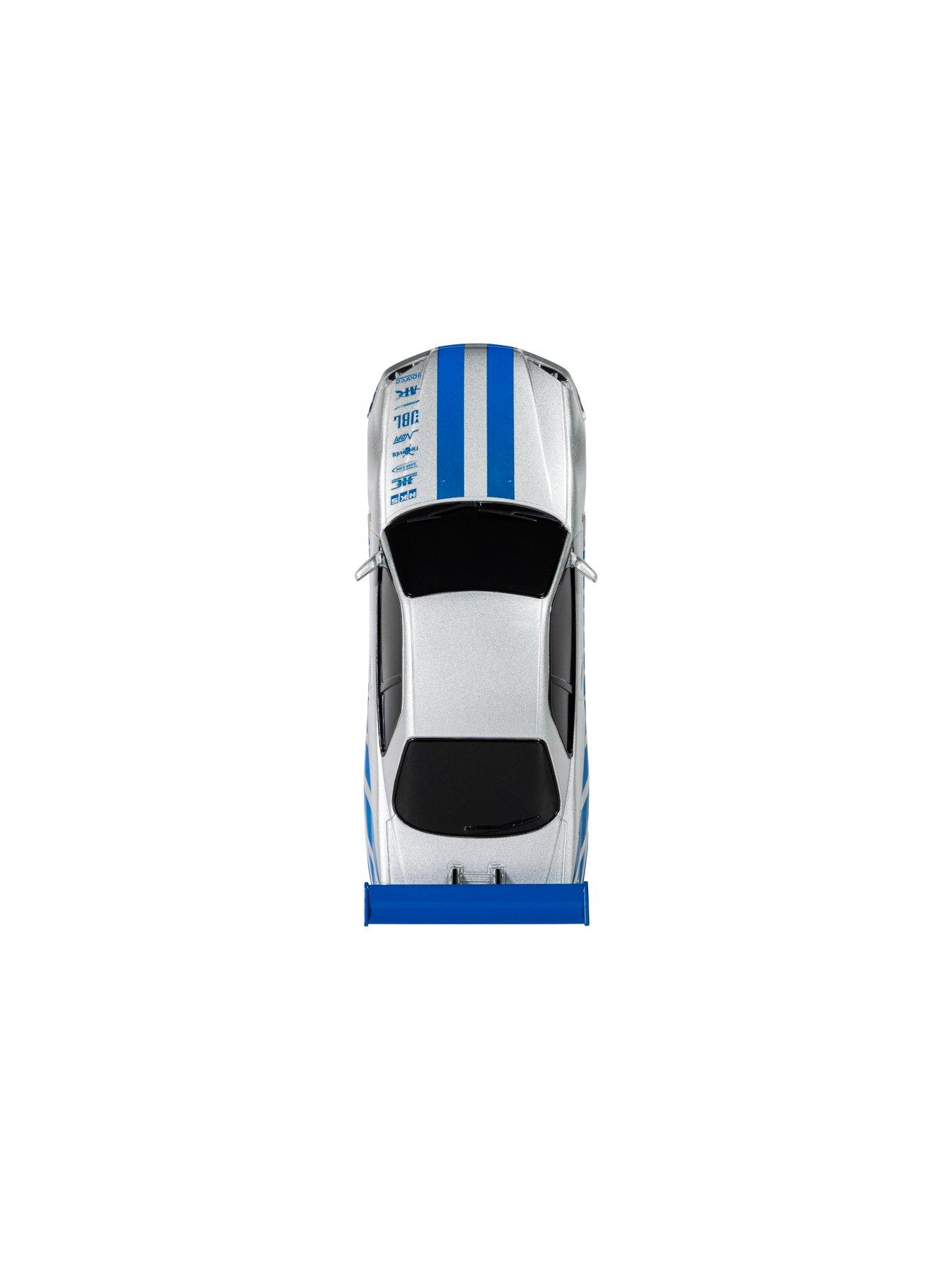 Image 6 of 7 of Scalextric Fast and Furious - 25 Years - Supra vs R34