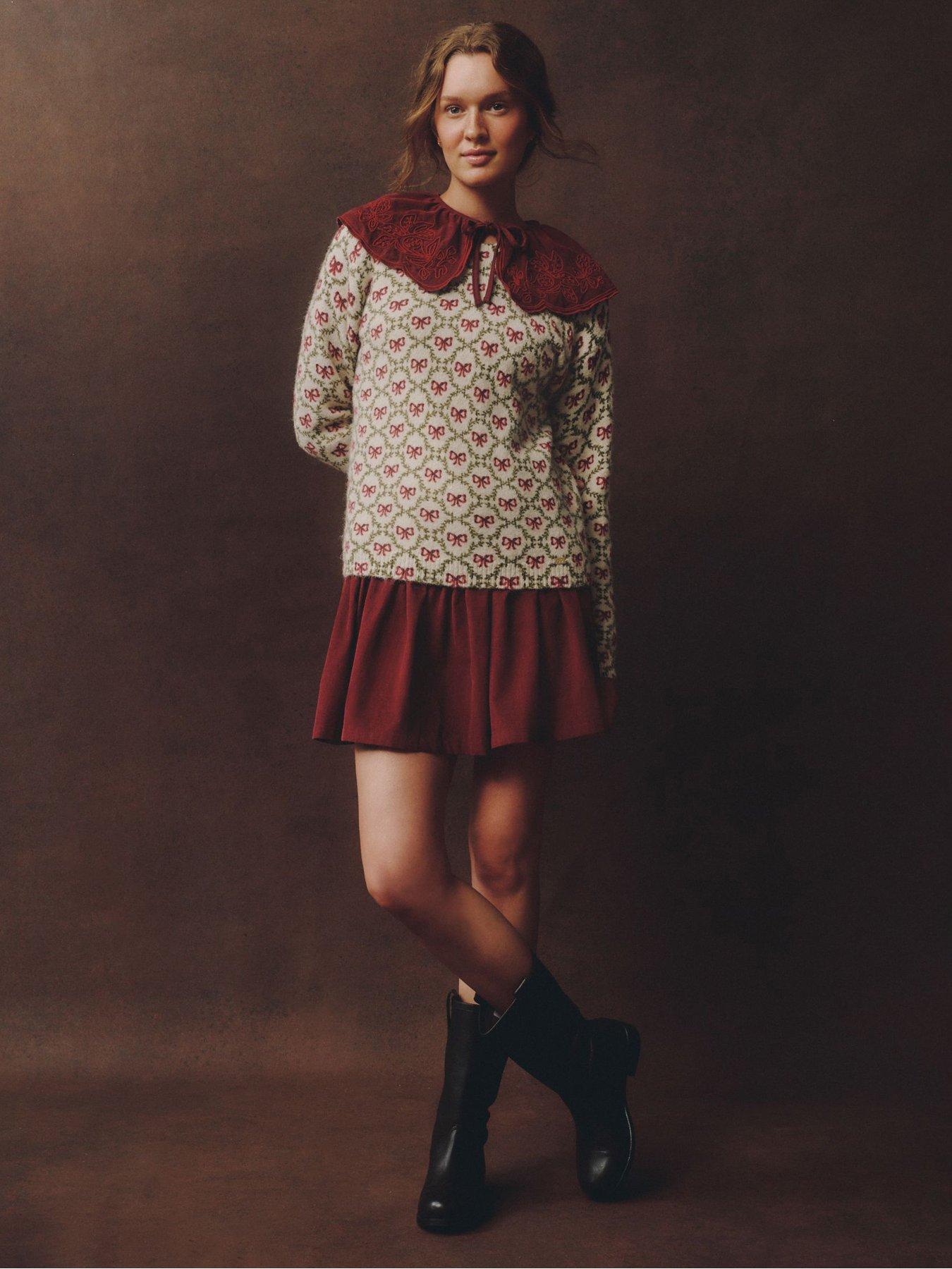 Image 1 of 5 of Laura Ashley Christmas Bow Jumper - Beige