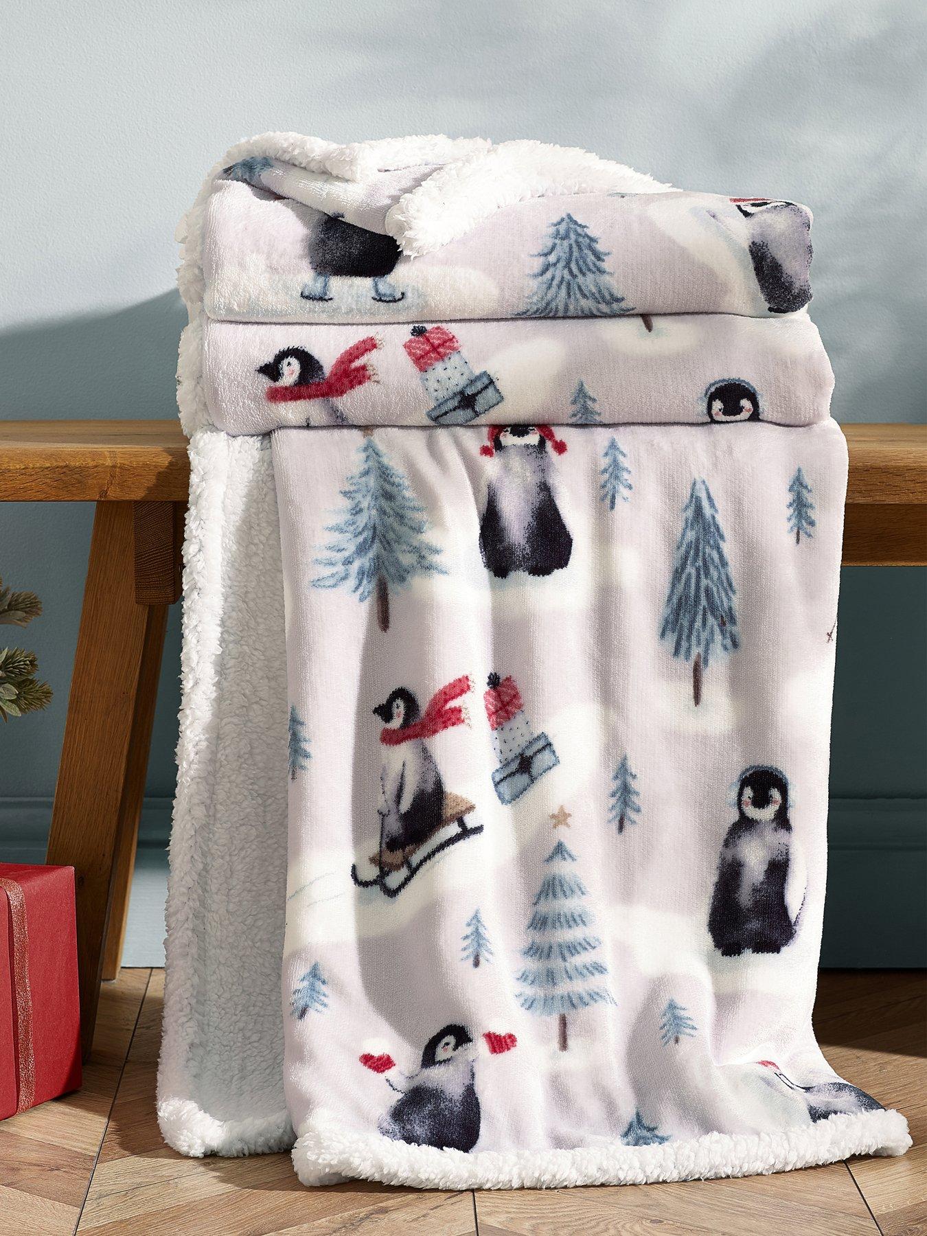 Image 1 of 3 of Catherine Lansfield Christmas Penguins Soft Fleece Sherpa Throw