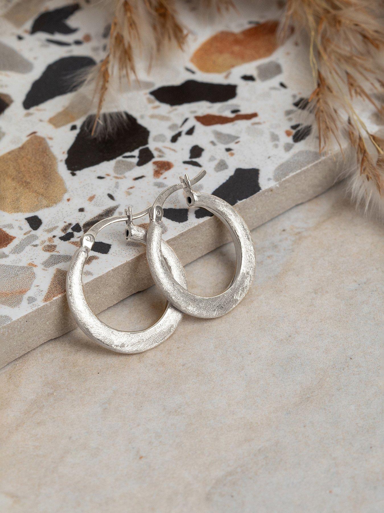 Image 4 of 5 of The Love Collection Sterling Silver Textured Hoop Creoles