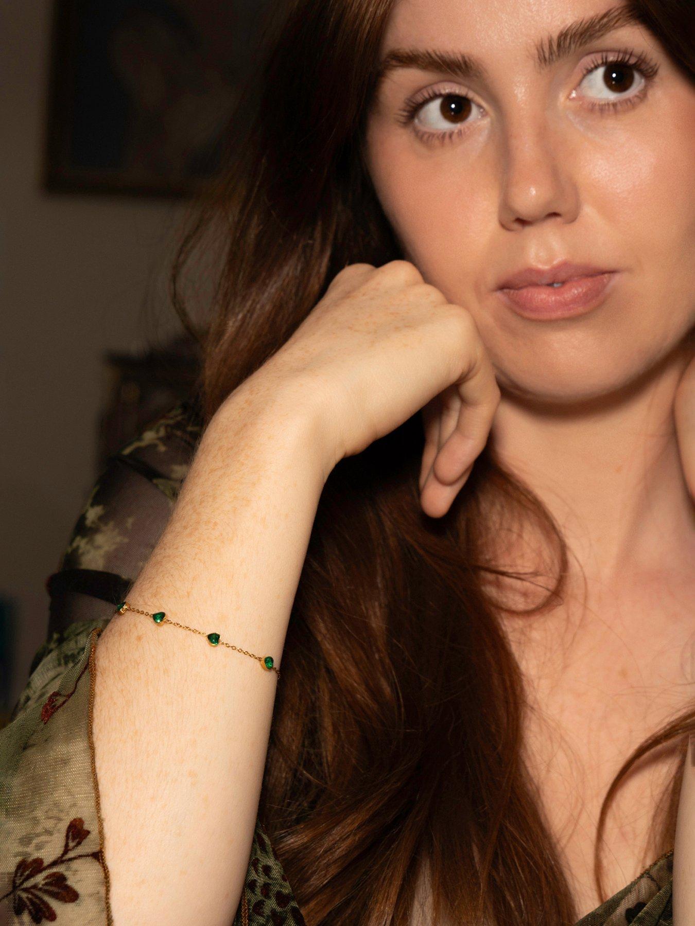 Image 2 of 5 of The Love Collection Gold Plated Stainless Steel Emerald CZ Multi Heart Enamel Bracelet