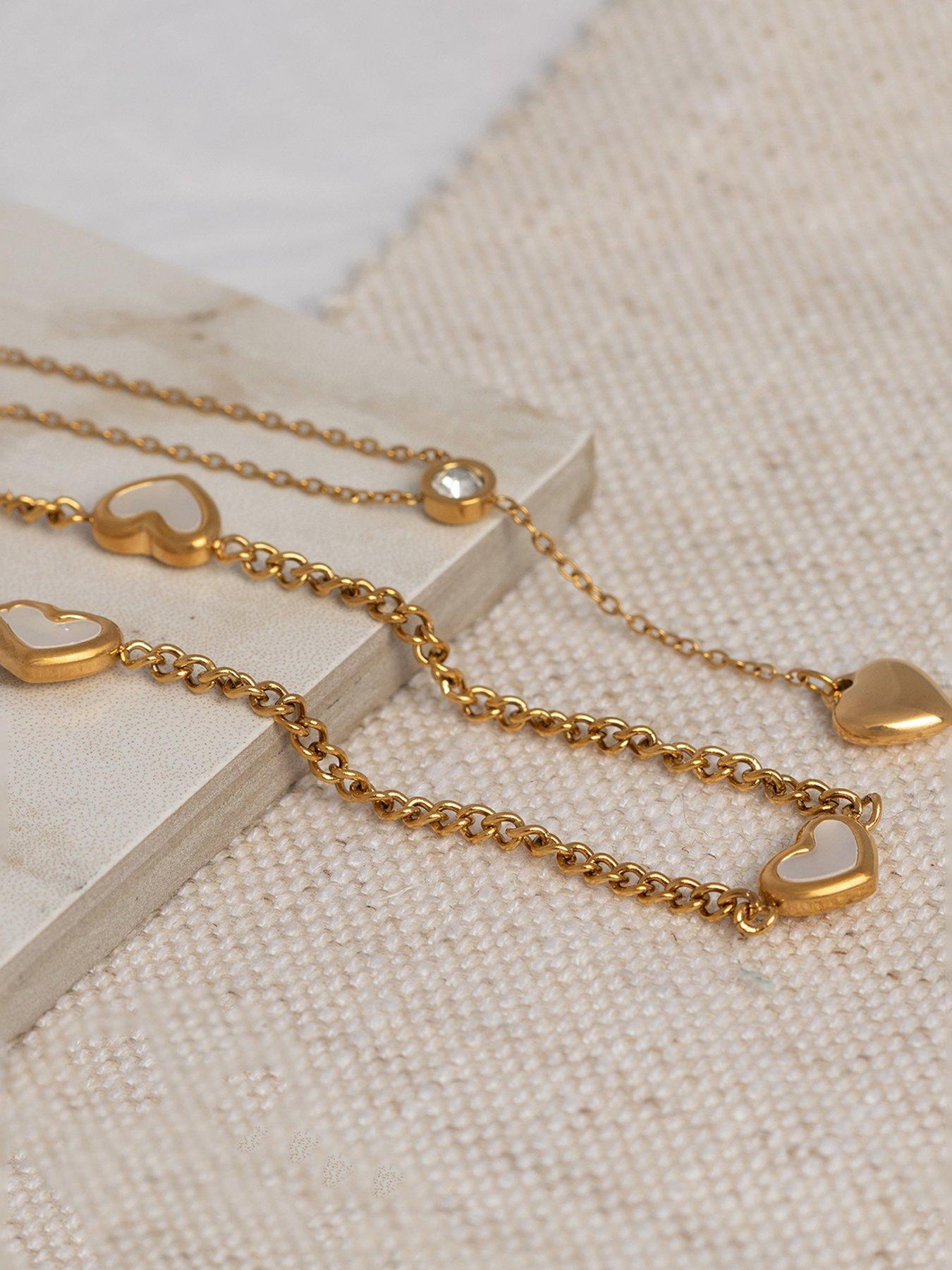 Image 6 of 7 of The Love Collection Gold Plated Stainless Steel Mother of Pearl and CZ Lariat Heart Necklace Set