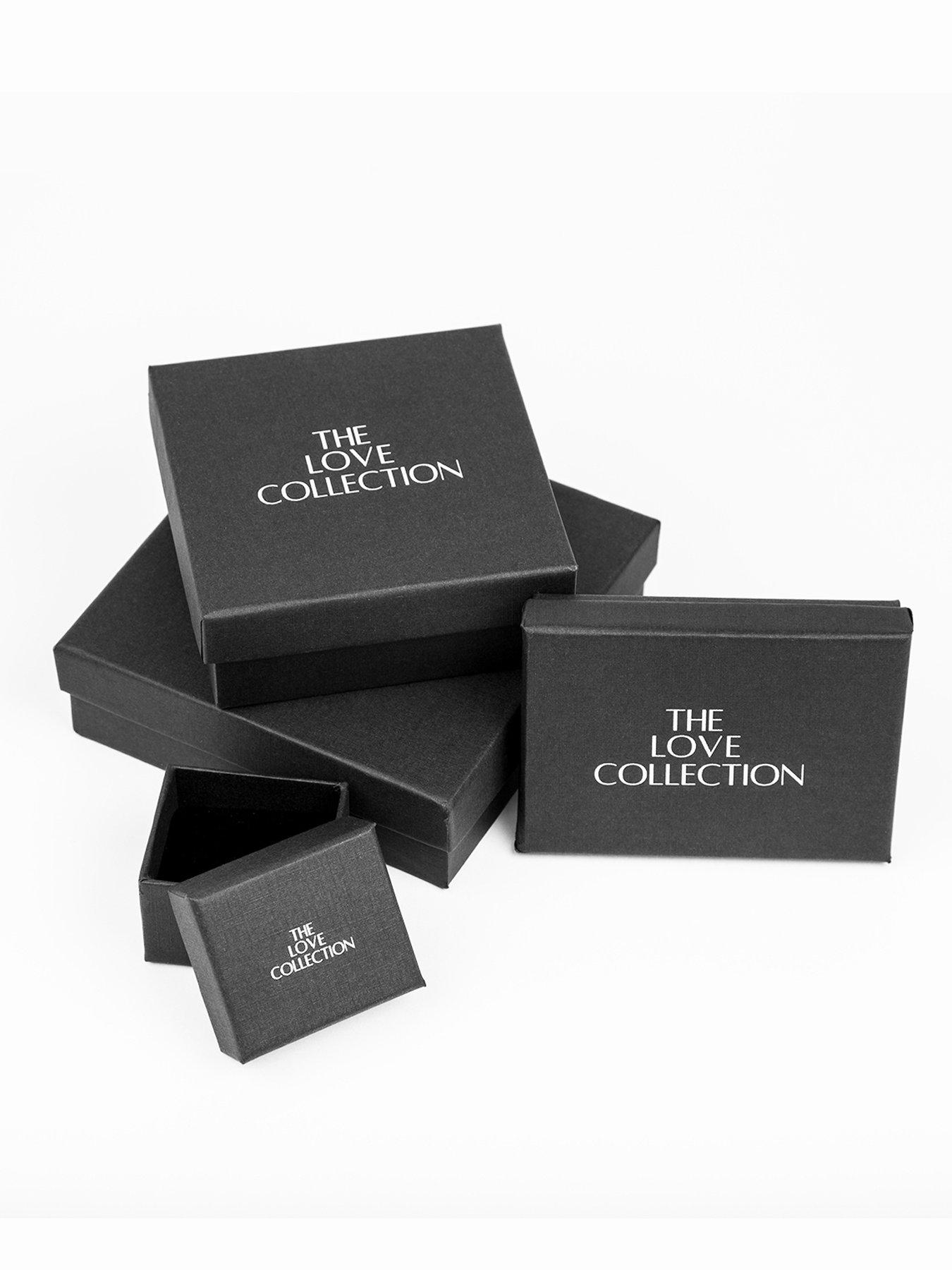 Image 5 of 6 of The Love Collection Gold Plated Stainless Steel CZ Interlocking Rings