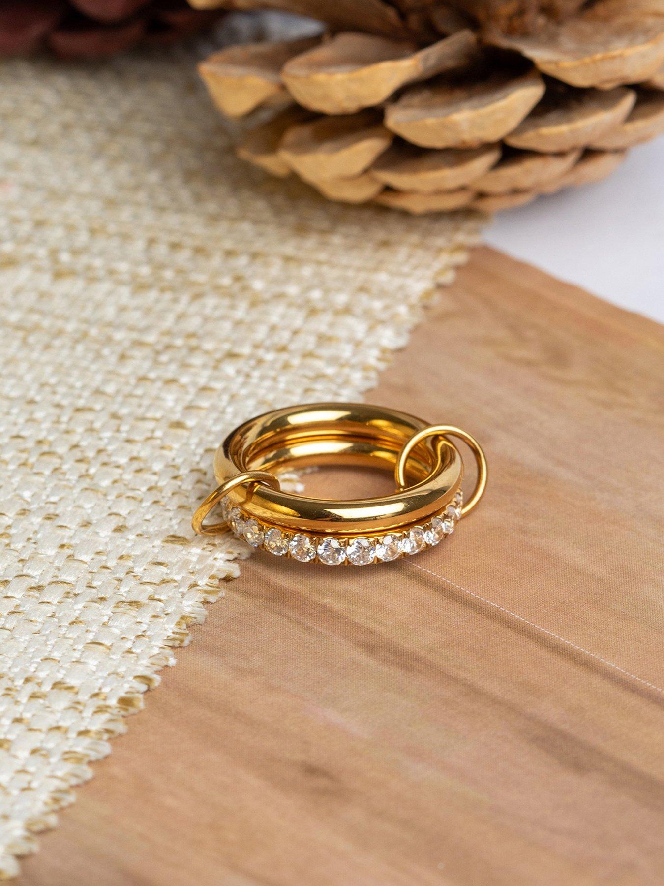 Image 6 of 6 of The Love Collection Gold Plated Stainless Steel CZ Interlocking Rings