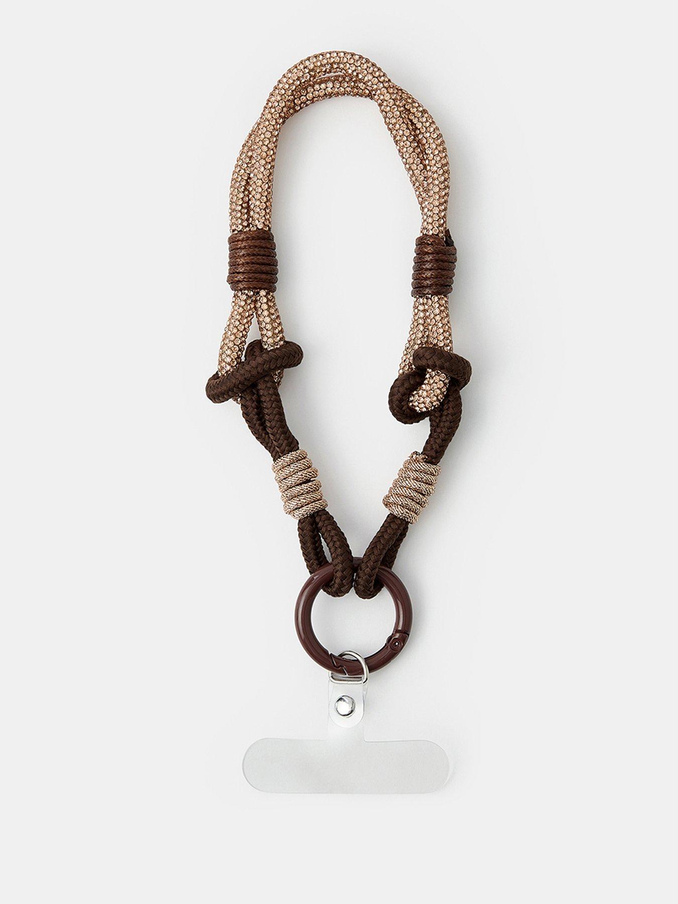 Image 1 of 2 of Accessorize Diamante Cord Wrist Strap - Brown