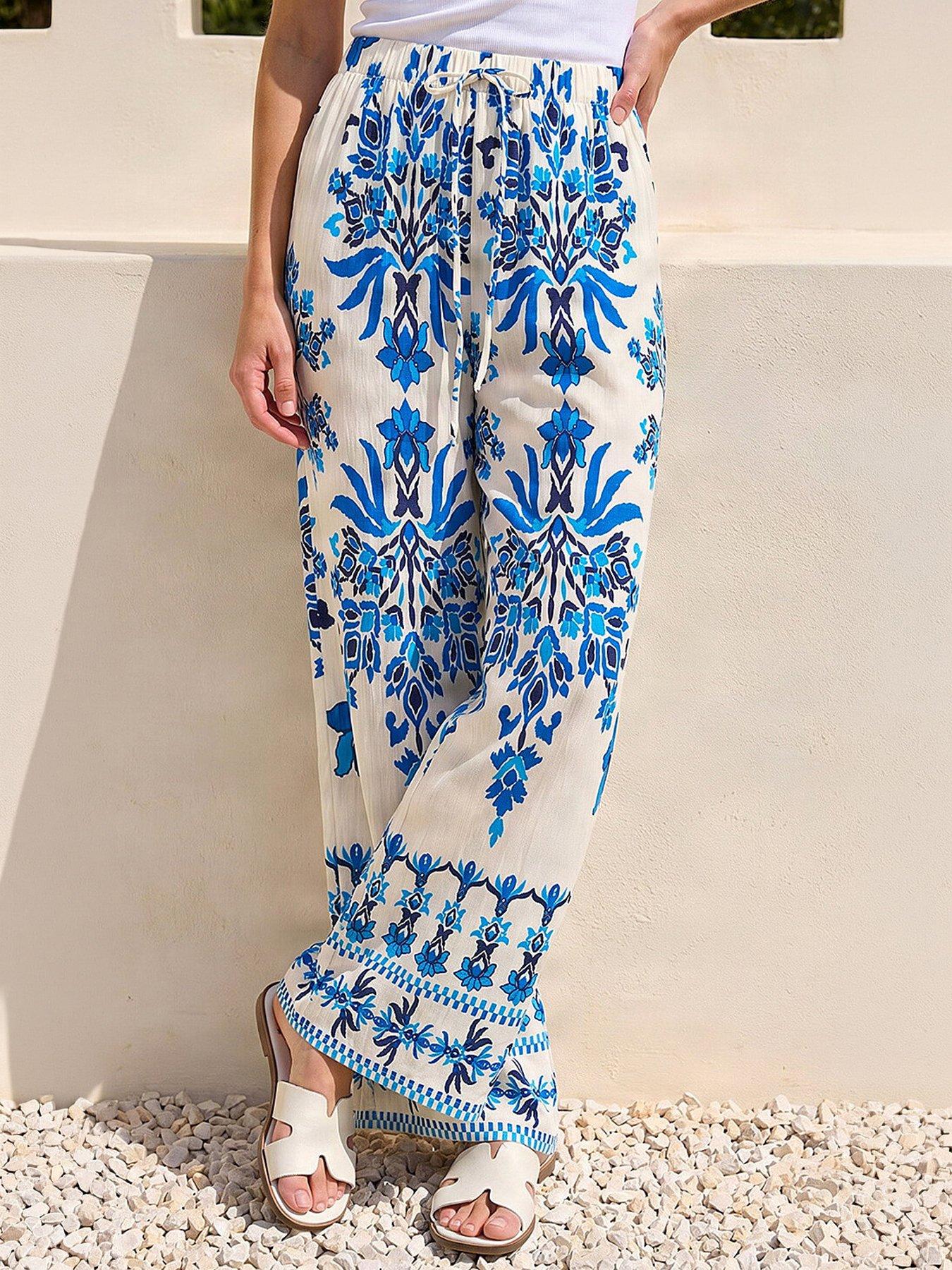 Roman Border Print Trousers