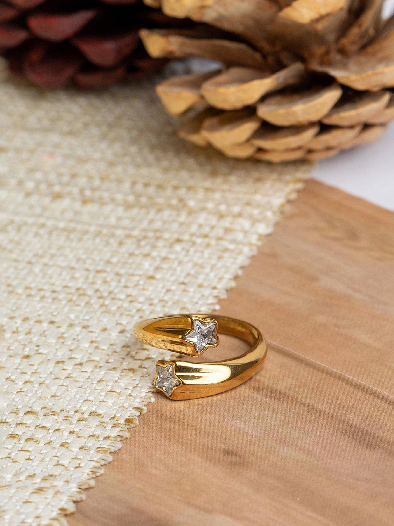 Image 6 of 6 of The Love Collection Gold Plated Stainless Steel Star CZ Ring